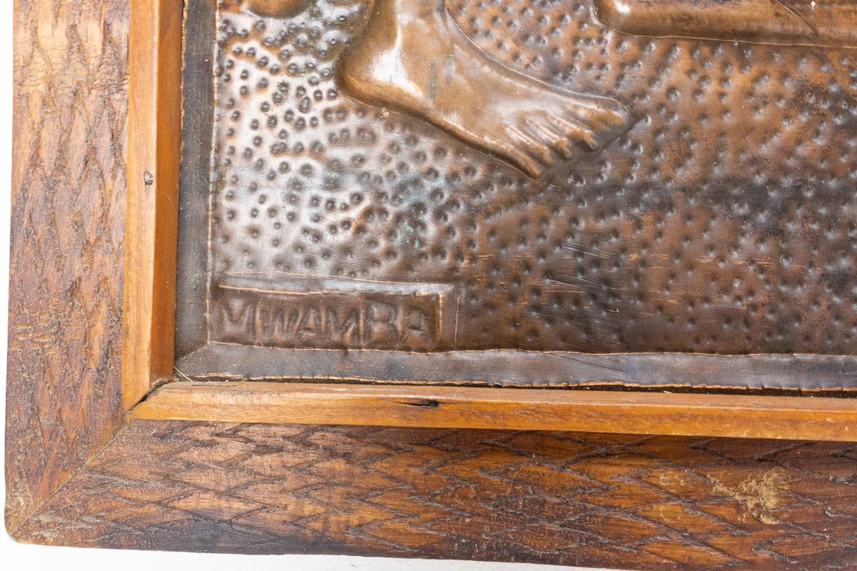 Mid-20th Century Representation of an African Woman Embossed Copper and Iroko Frame For Sale