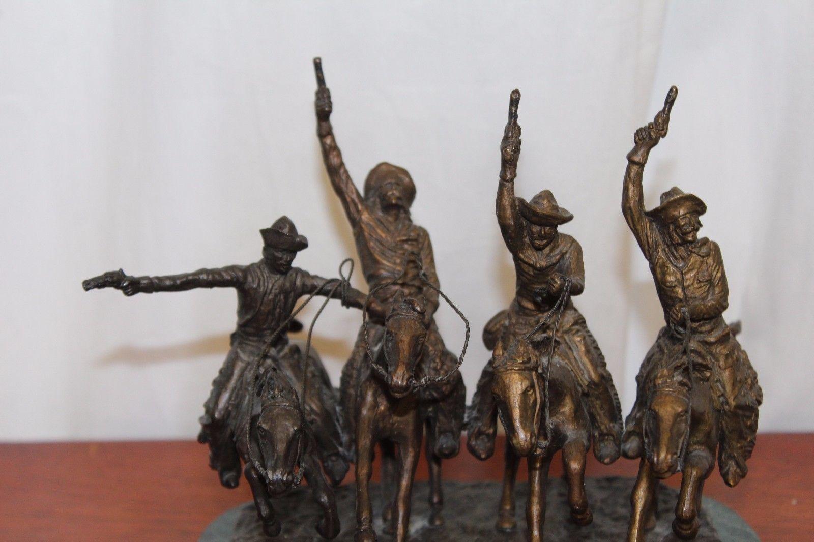 A detailed bronze sculpture copyright by Frederic Remington, The piece is in great condition and has great detailing. Original statues are large and this one is very small reproduction but still very heavy. 

Frederic Sackrider Remington (October
