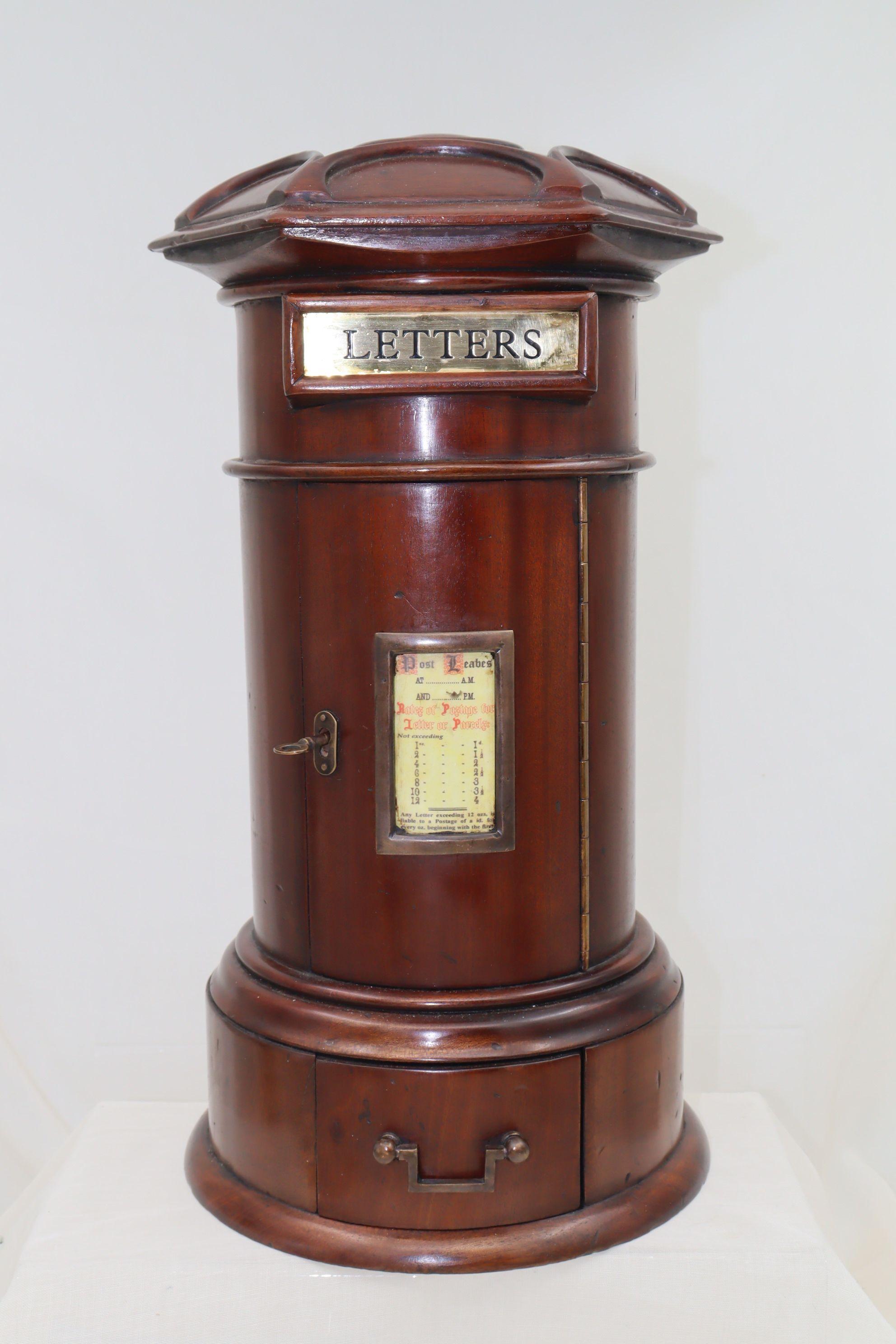 This good quality mahogany country house letter box is a wonderfully decorative 20th century reproduction of one that would have stood on a table in the lobby or foyer of a country house, club or up market guest house around the latter part of the
