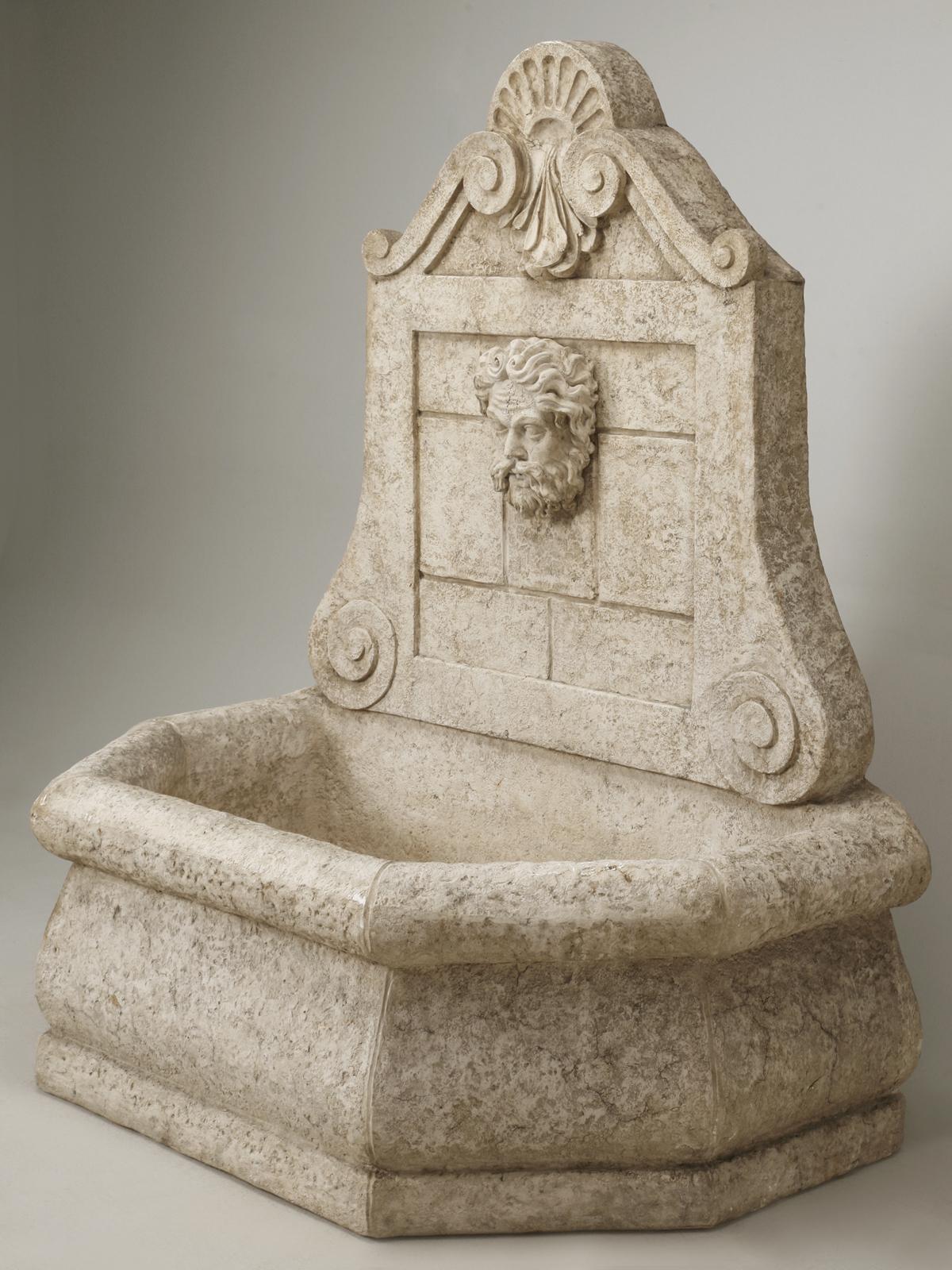 Reproduction 18th century French Style Faux Stone Garden Fountain imported from England during the 1990s. This is a functional Garden Fountain made from fiberglass to look like French Limestone. We have recently taken the liberty of coating the