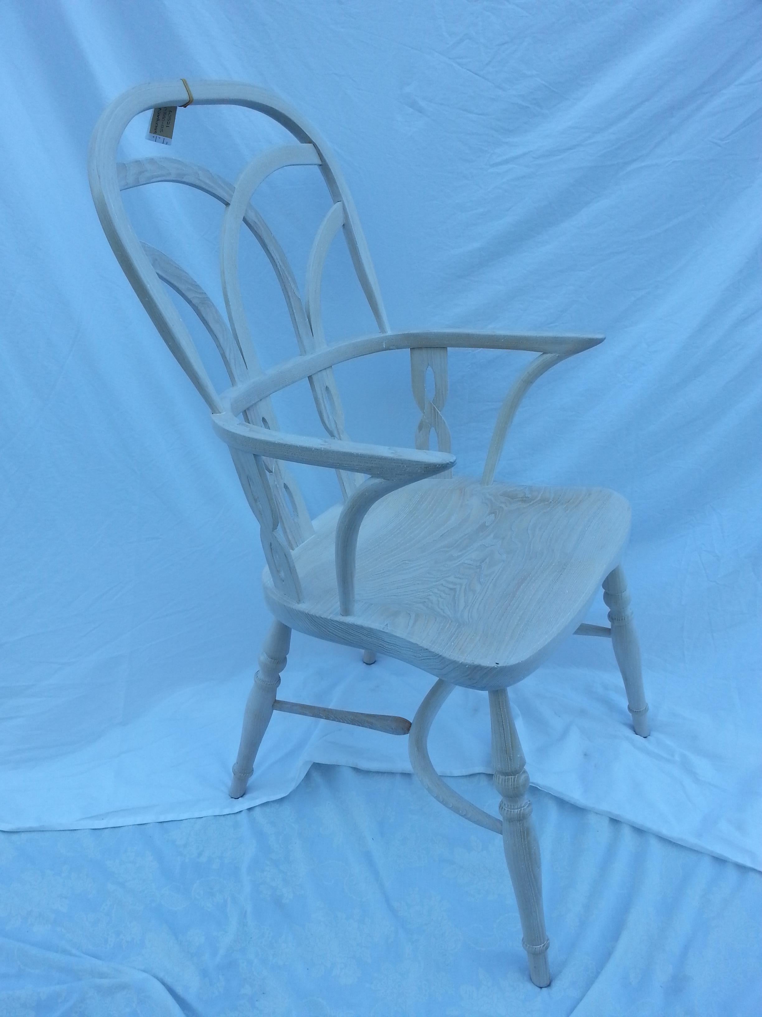 Reproduction Gothic interlace whitewash chair with arms.