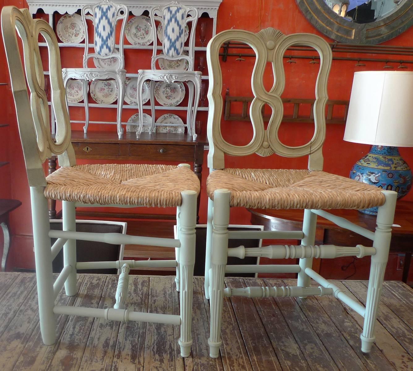 These chairs are a reproduction of French 19th century Louis XVI dining-chairs with large rush seat made to order.
 