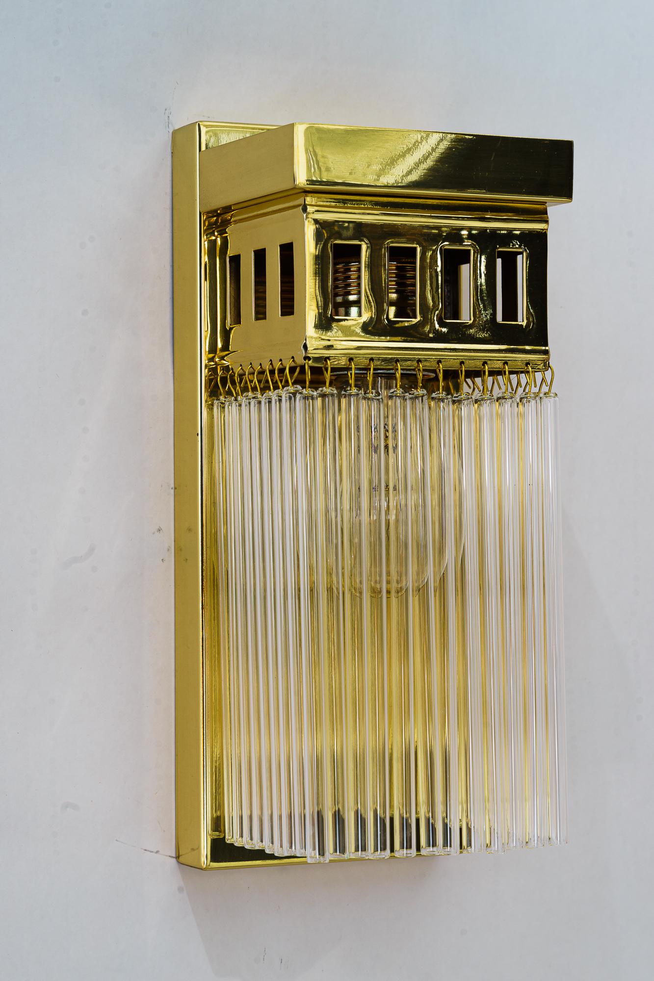 Austrian Reproduction of a art deco wall lamp with glass sticks For Sale