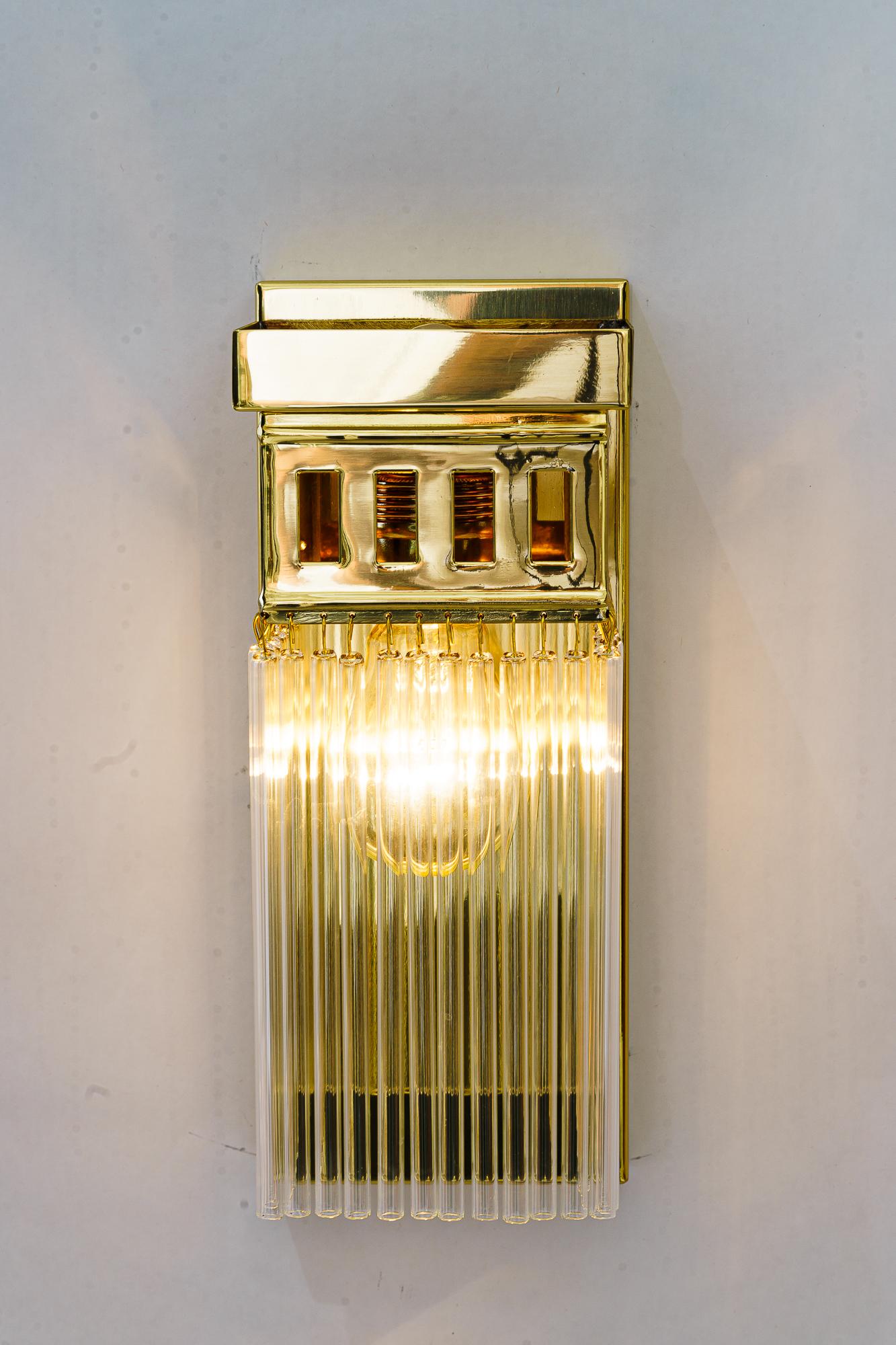 Contemporary Reproduction of a art deco wall lamp with glass sticks For Sale