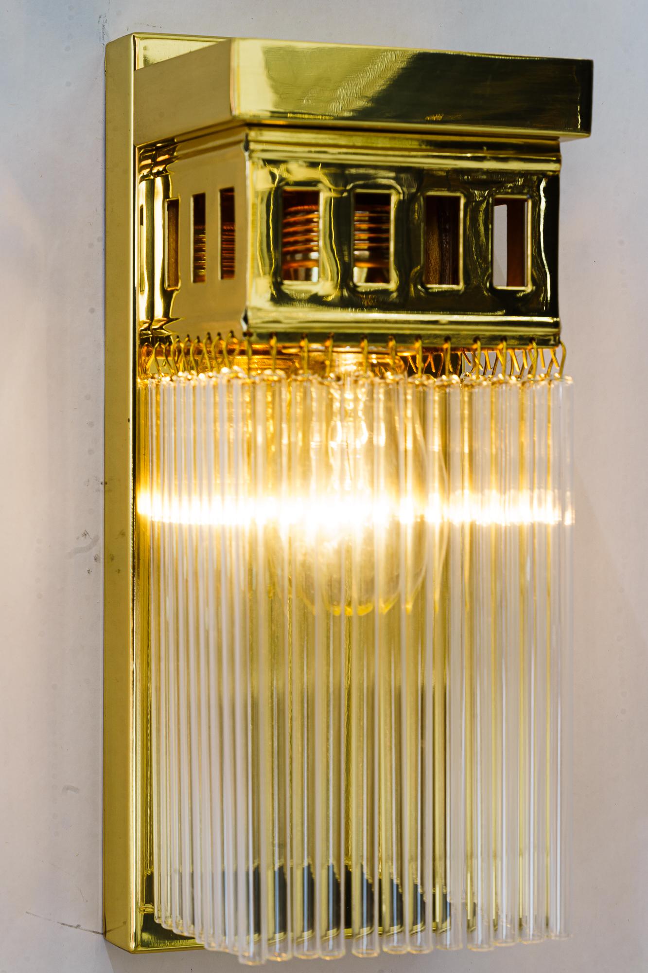 Reproduction of a art deco wall lamp with glass sticks For Sale 1