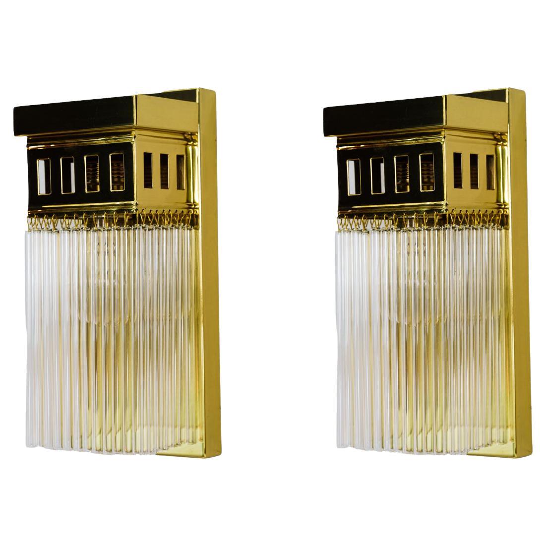 Reproduction of a art deco wall lamp with glass sticks For Sale