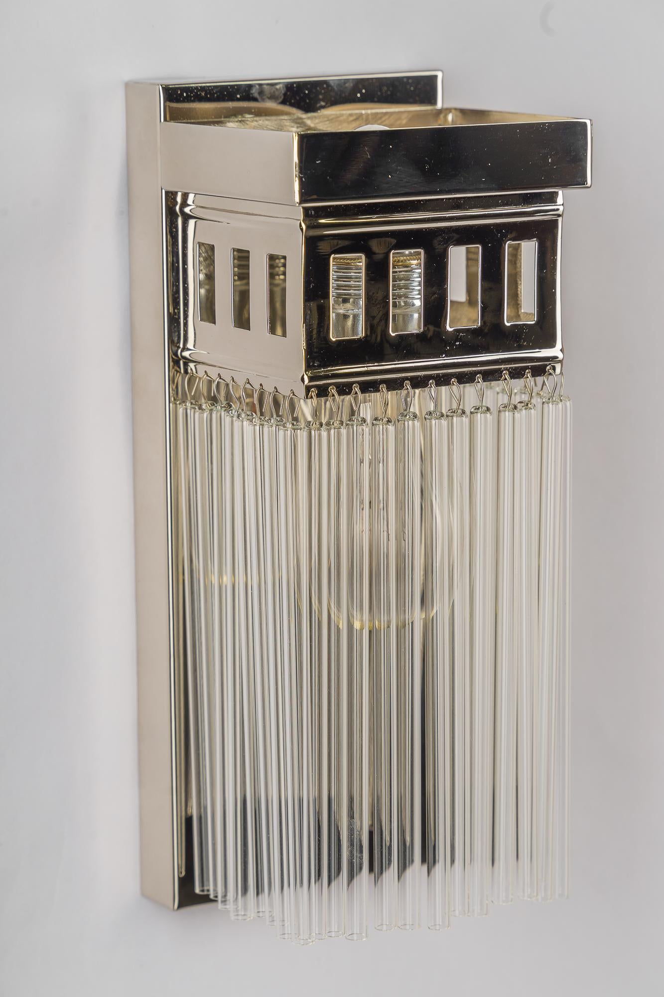 Art Deco Reproduction of a nickel - plated art deco wall lamp with glass sticks For Sale