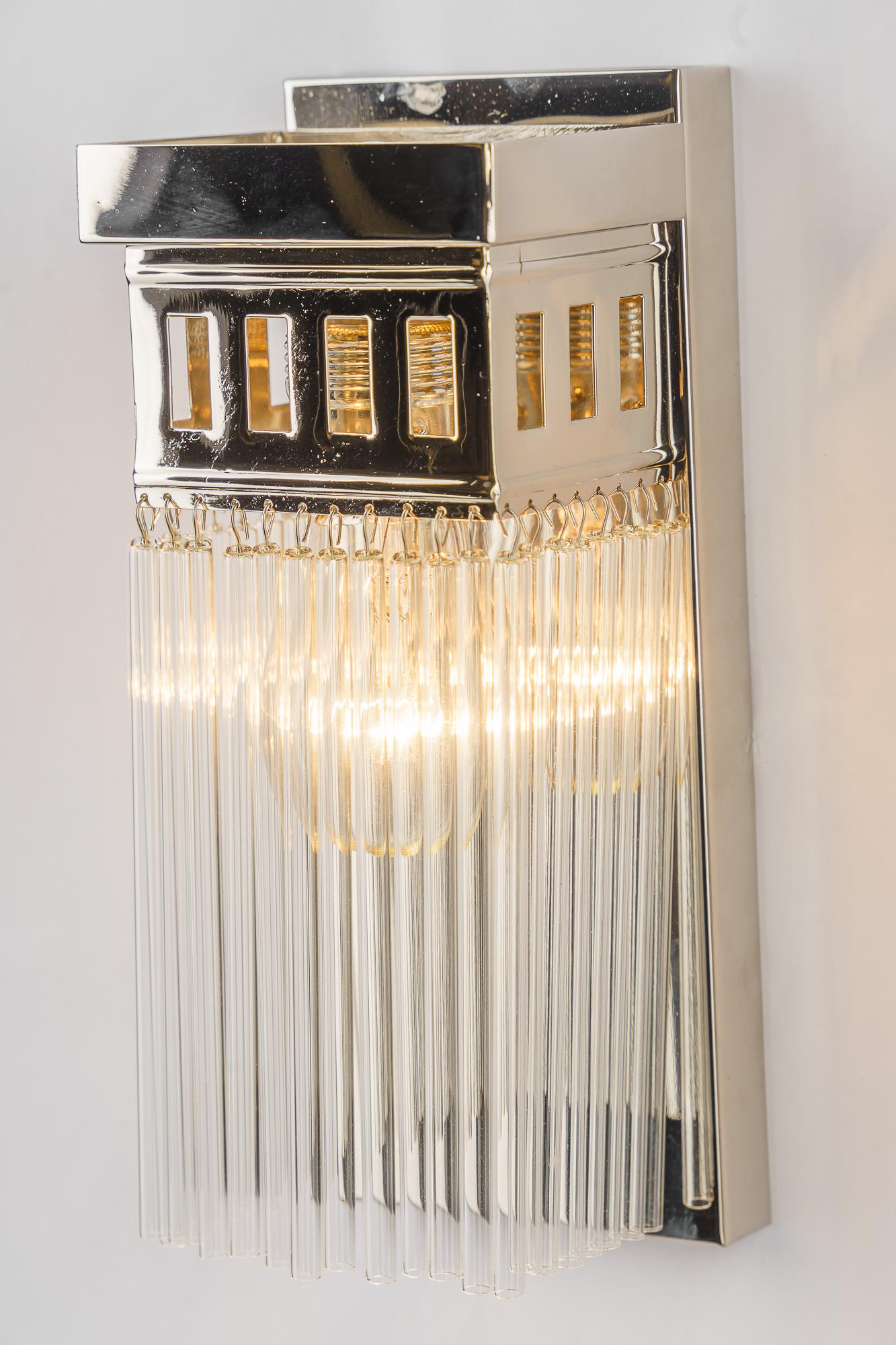 Plated Reproduction of a nickel - plated art deco wall lamp with glass sticks For Sale