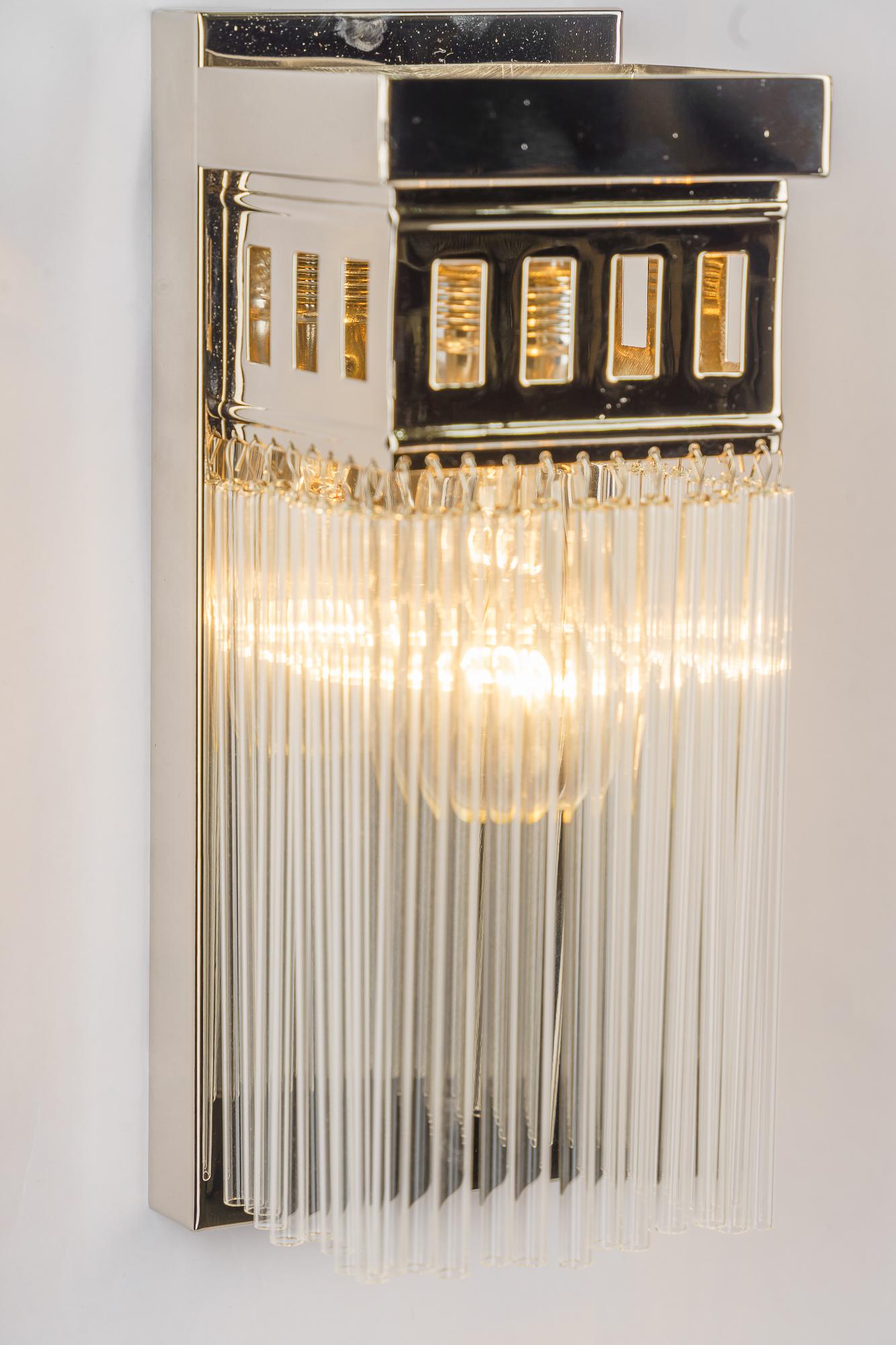 Brass Reproduction of a nickel - plated art deco wall lamp with glass sticks For Sale