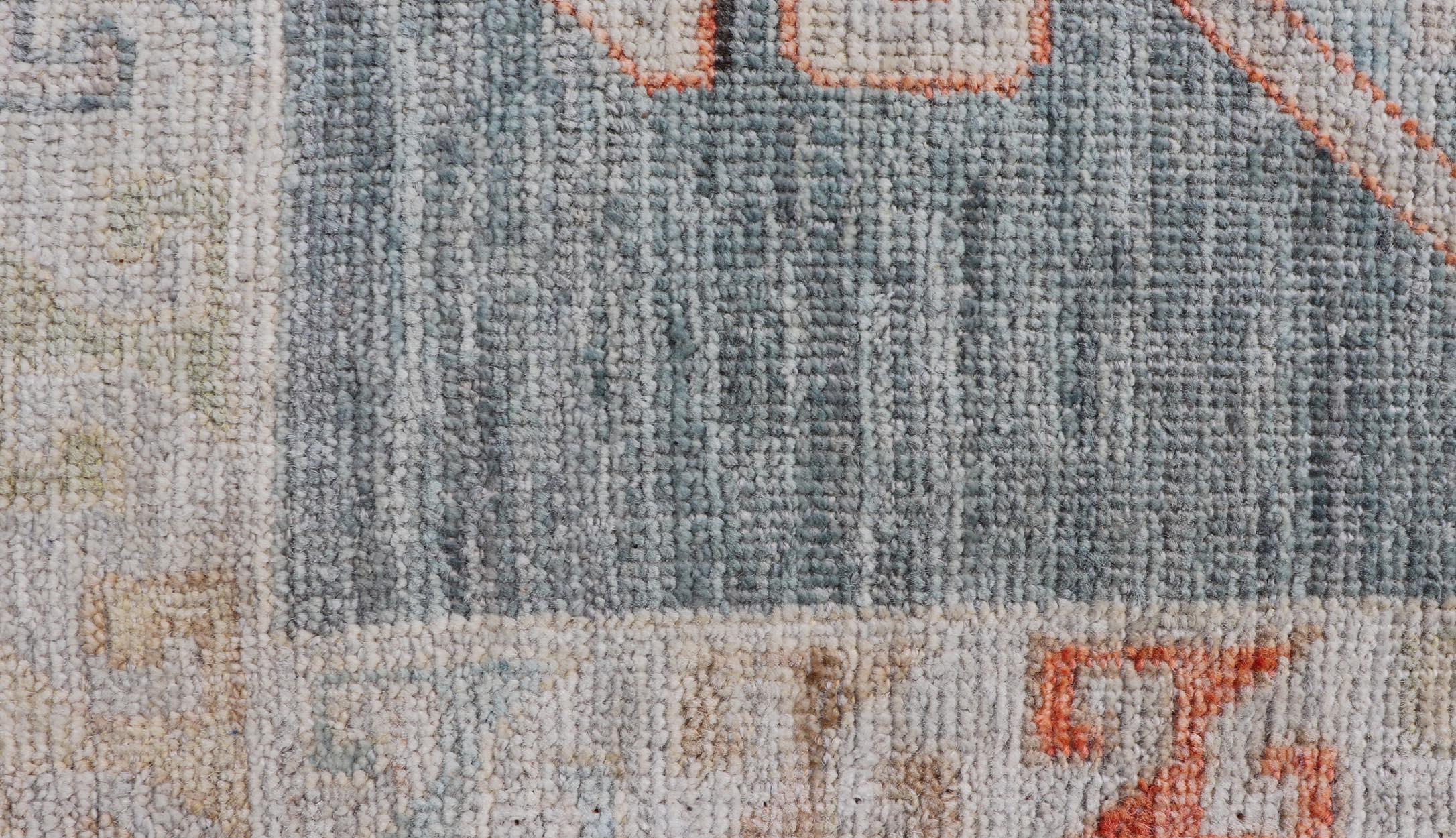 Hand-Knotted Reproduction Oushak Rug with Soft Gray, Ivory, and Coral Accents 2'1 x 3'3 For Sale