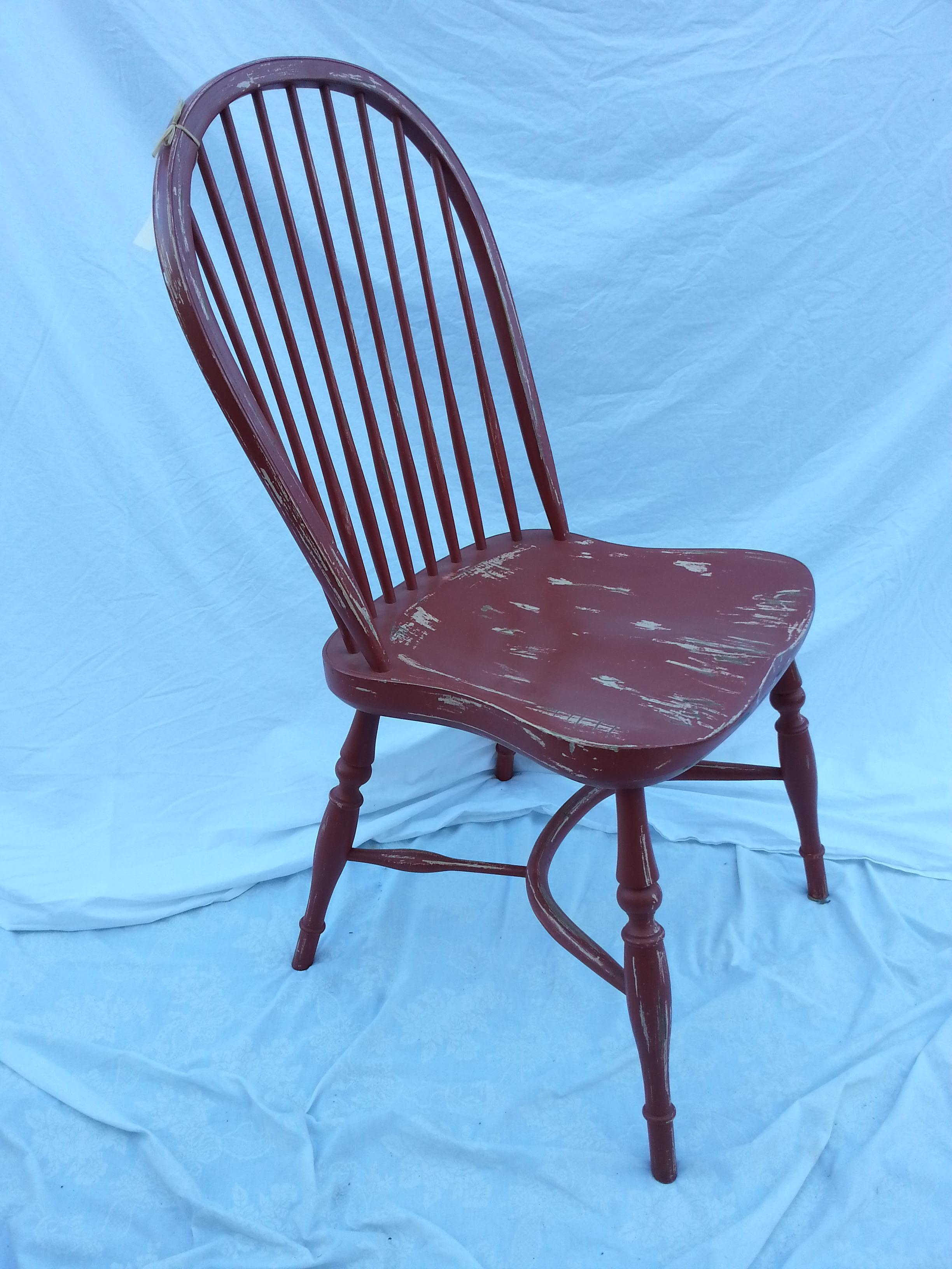 Reproduction spindle back red side chair.