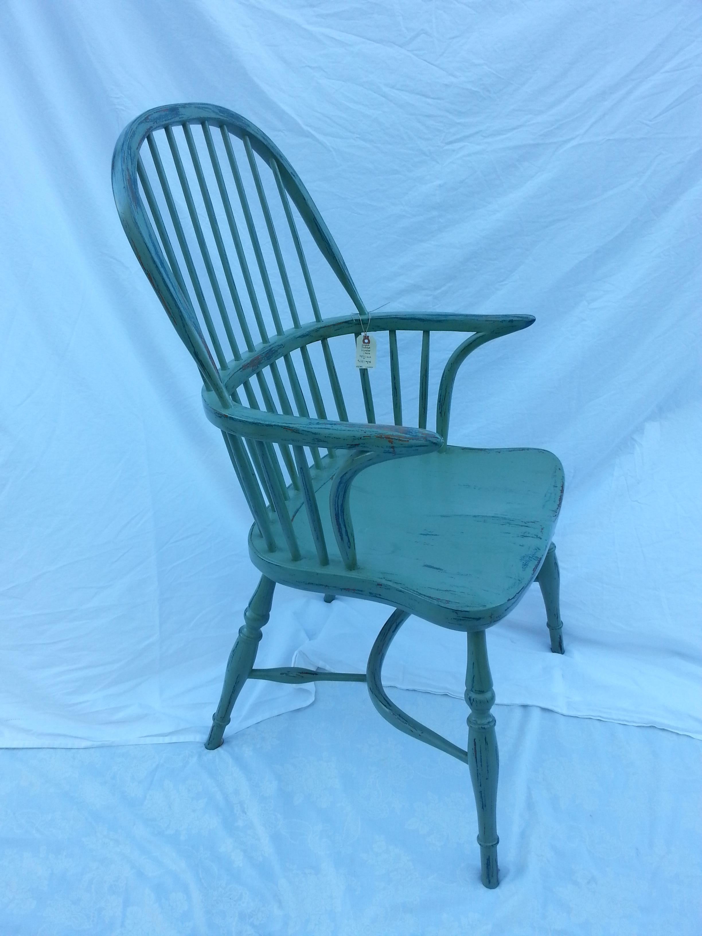 Reproduction spindle back slate armchair.