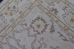 Reproduction Turkish Oushak Rug with Stylized Floral Design in Earth Tone Colors