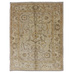 Reproduction Turkish Oushak Rug with Stylized Floral Design in Earth Tone Colors