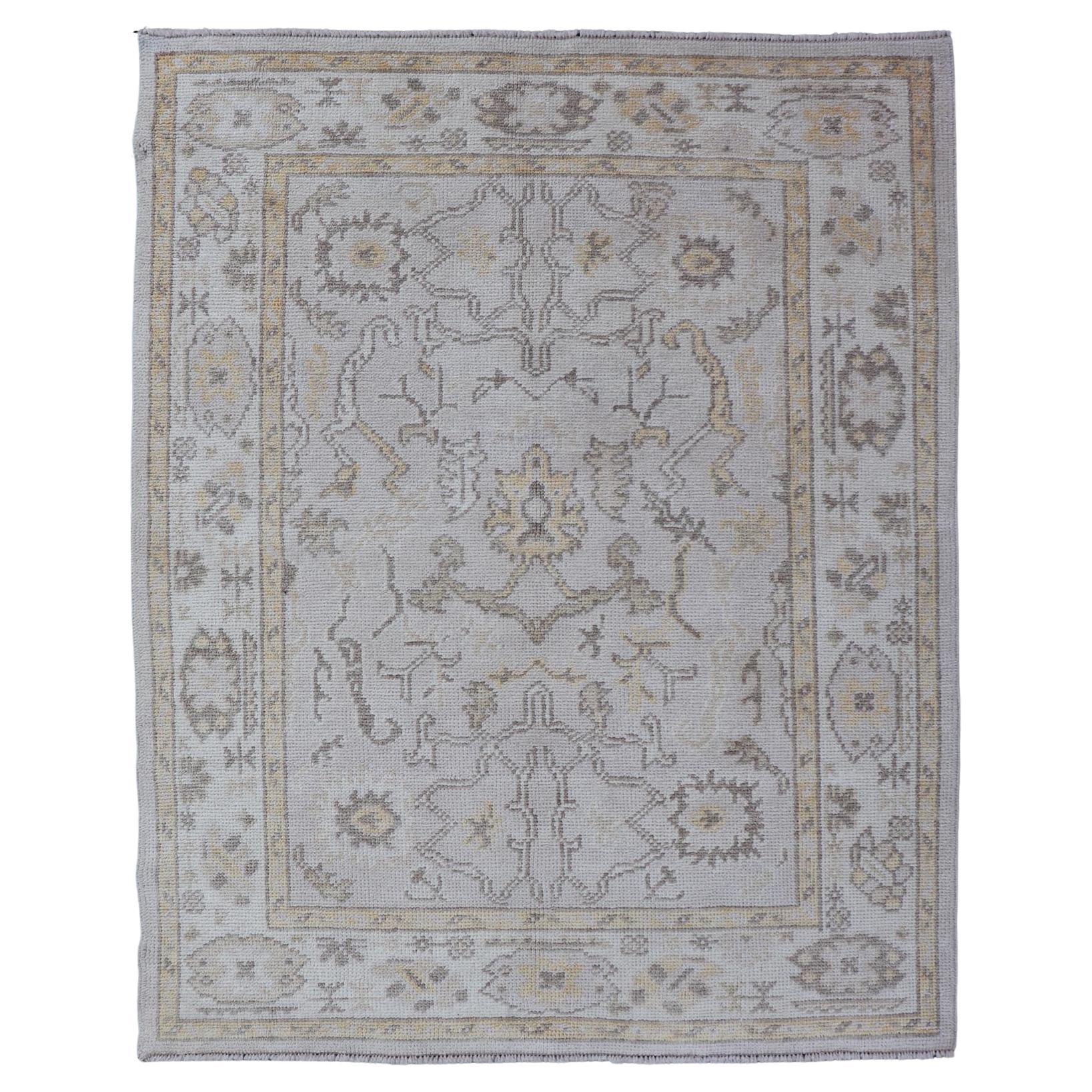 Reproduction Turkish Oushak Rug with Stylized Floral Design in Earth Tone Colors