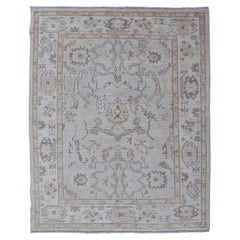 Reproduction Turkish Oushak Rug with Stylized Floral Design in Earth Tone Colors