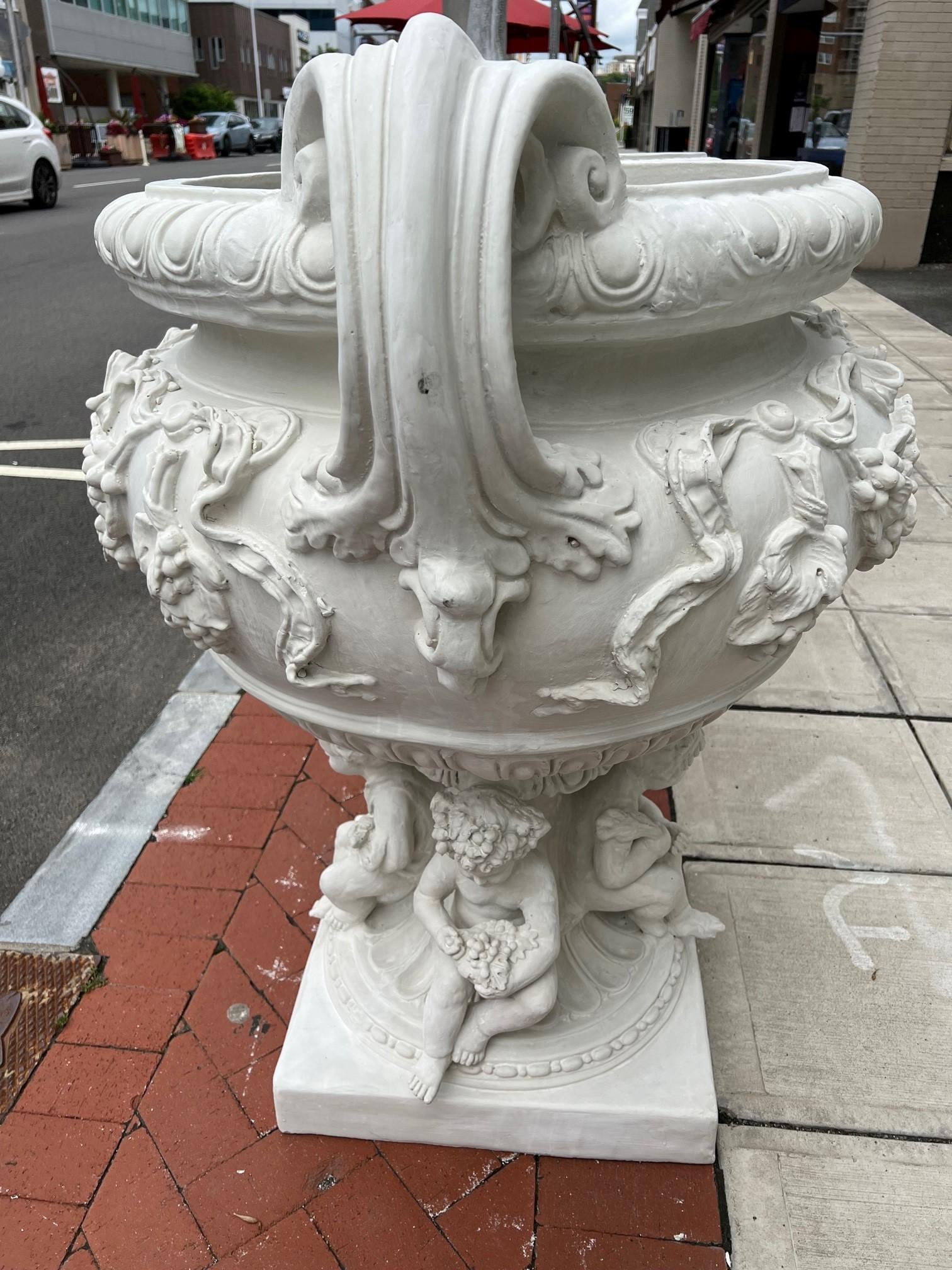 Reproduction White Fiberglass Urn with Large Handles Grape Vines and Cherubs   For Sale 2