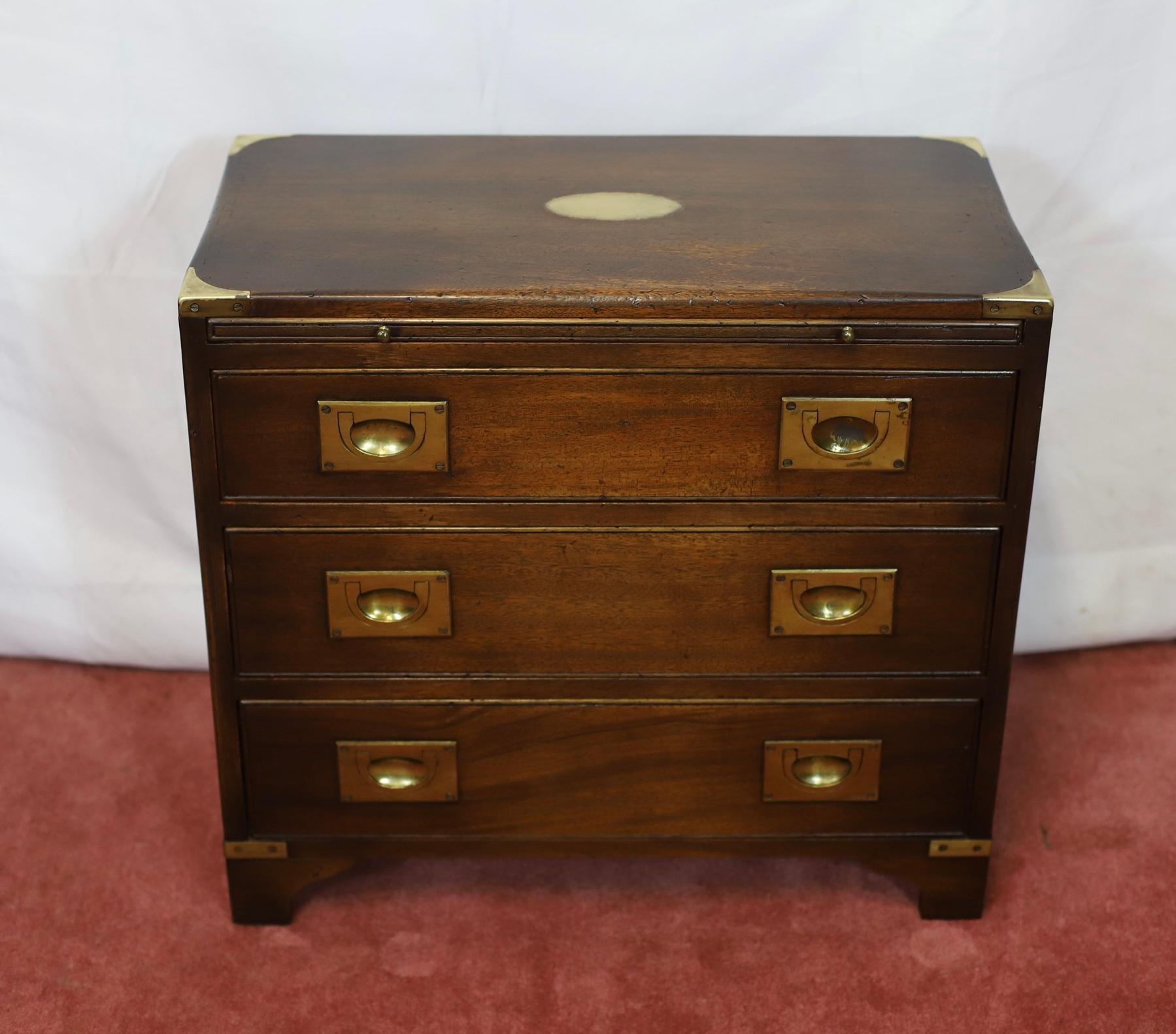 We delight to offer for sale this stunning three drawer campaign chest of drawers with a pull out surface and brass sunken handles, brass corner fittings and central brass oval plaque , lovely condition .
Don't hesitate to contact me if you have any