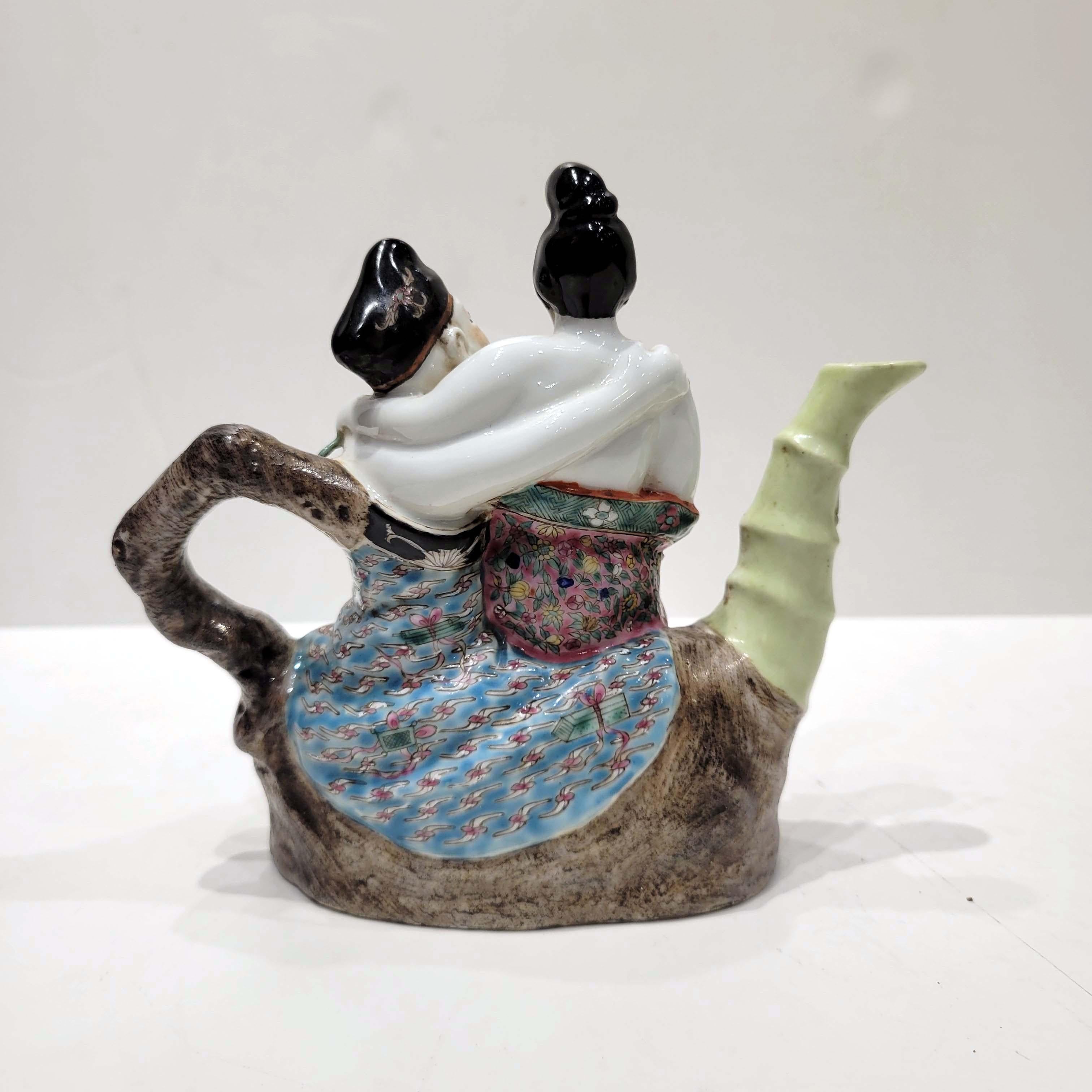 A wonderful Chinese export porcelain wine ewer, circa early 20th century.
Depicting a couple in an erotic scene. The way the ewer gets filled is from the bottom opening. The liquid goes inside and can be poured out from the spout.
 