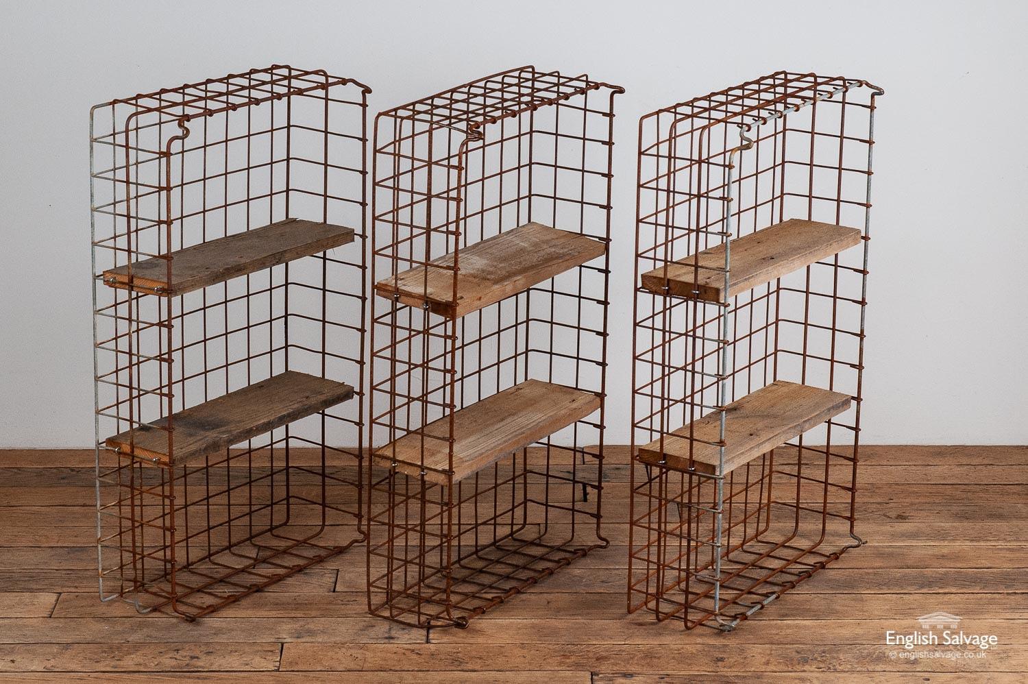 Vintage wirework bread storage baskets which have been repurposed into shelving units, each with two rustic reclaimed pine plank shelves (13cm deep). One shelving unit only has a single pine shelf, all the others have two shelves each. Maximum size