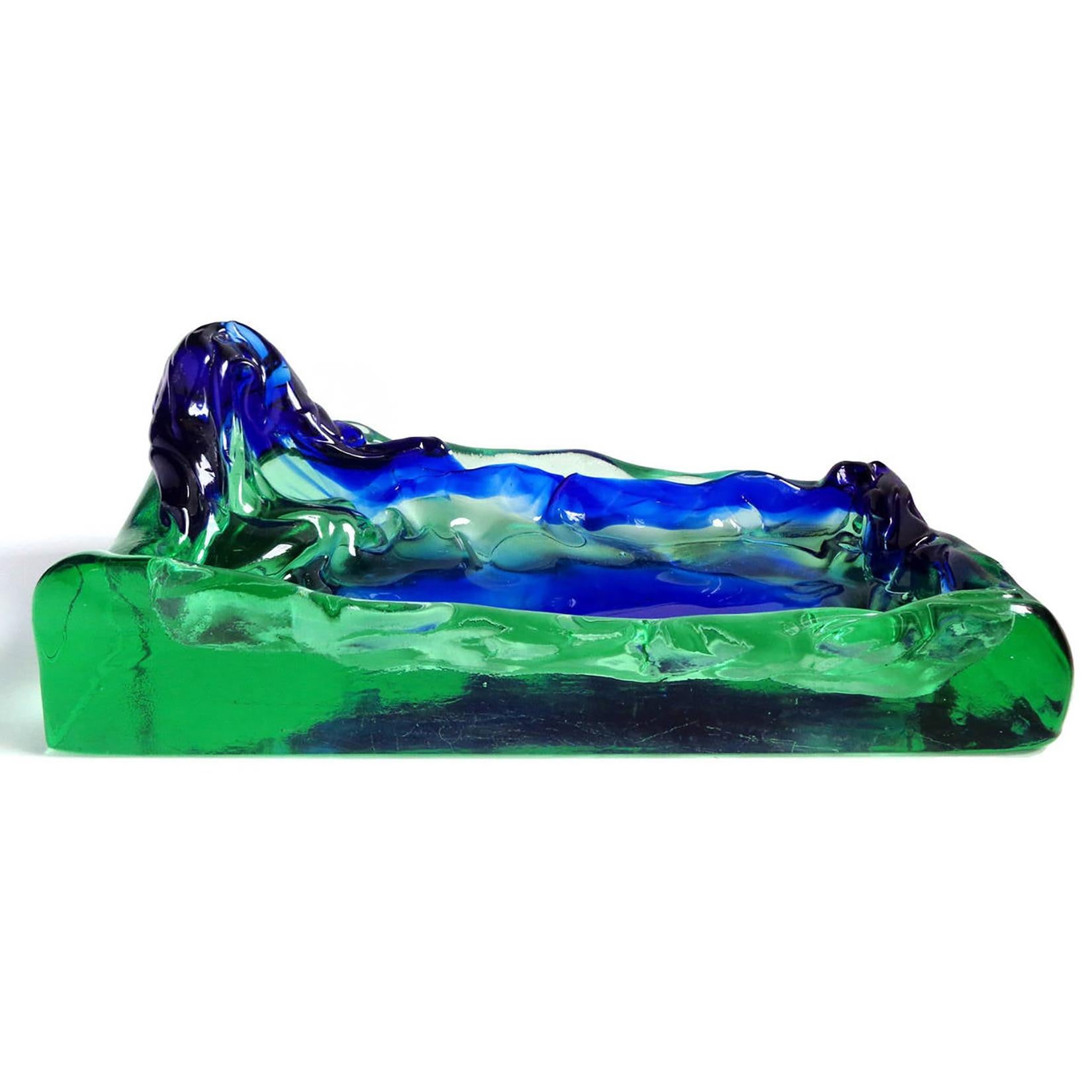 Reserved for Claire - 2 Salviati Items

Item Ref: LU974118571062
Beautiful, vintage Murano hand blown cobalt blue and green Sommerso coastal mountain range and lagoon beach Italian art glass bowl / tray. Documented to the Salviati Company. Great