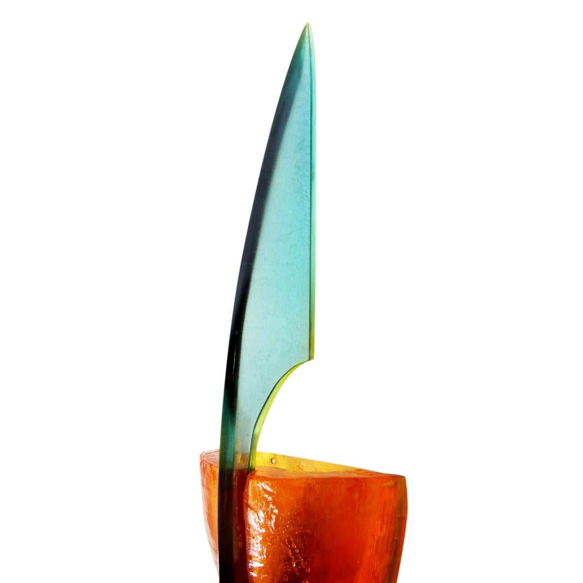 American artist Steve Zoller is unique in his use of color, elemental shapes and flamboyant style. In 1993 he made this beautiful floor lamp together with a table lamp, a sconce and two flower vases in the same luxurious style. The green fixture