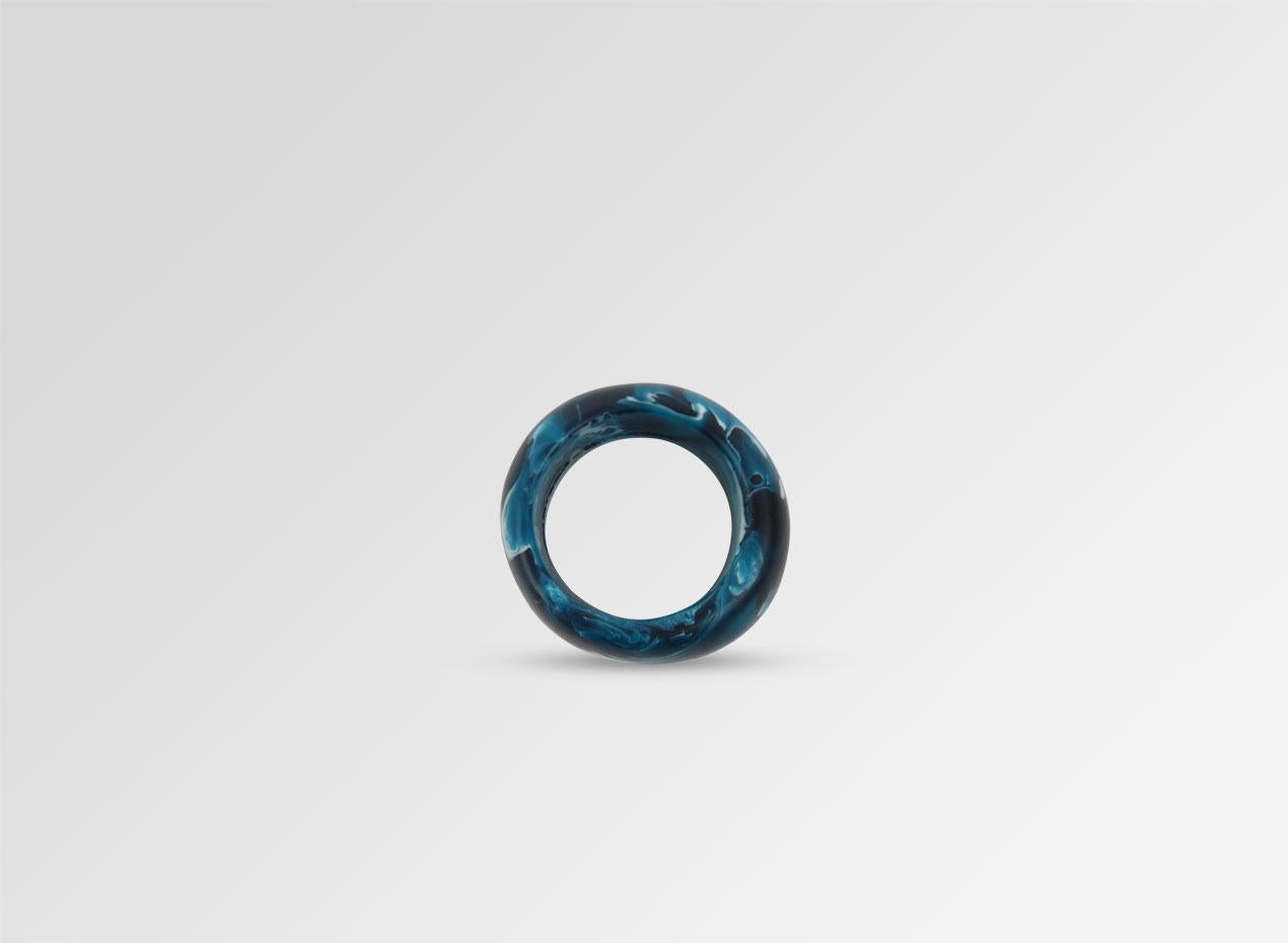 Resin band ring. This ring is featured in our Classic colour, Moody Blue. 

Dinosaur Designs resin products are hand made in Sydney, Australia. Each piece is unique and we cannot guarantee you will receive an item exactly identical to what is that