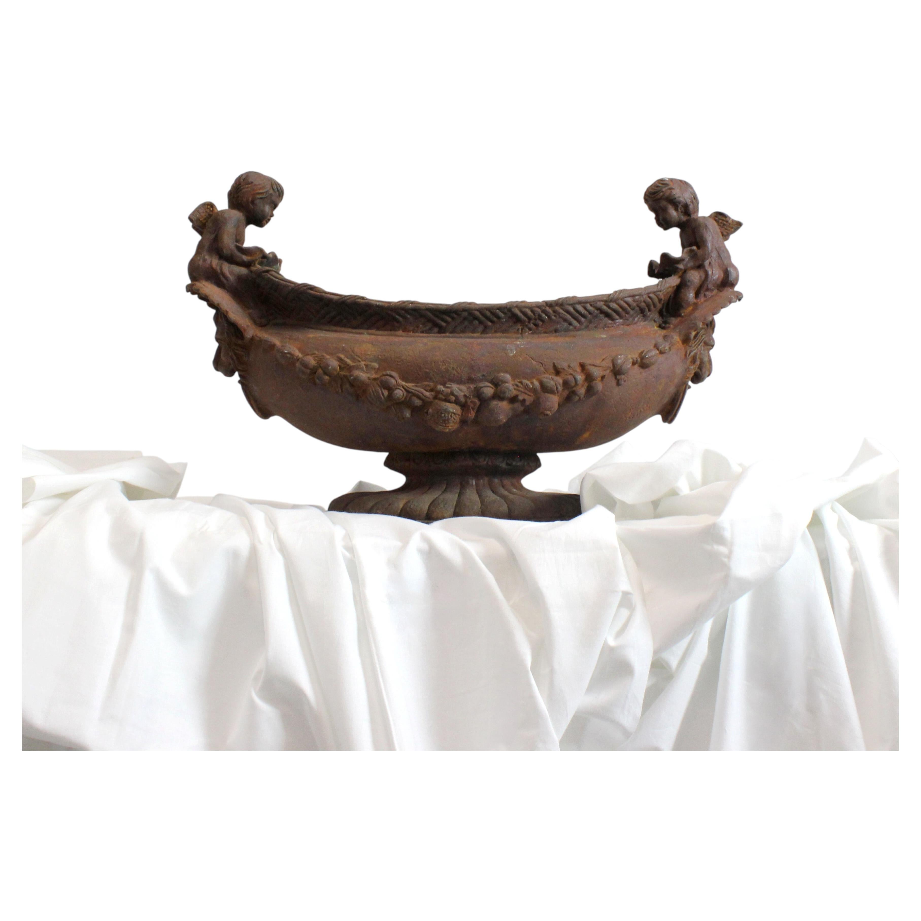 Resin centerpiece in the style of a planter, imitating cast iron. For Sale