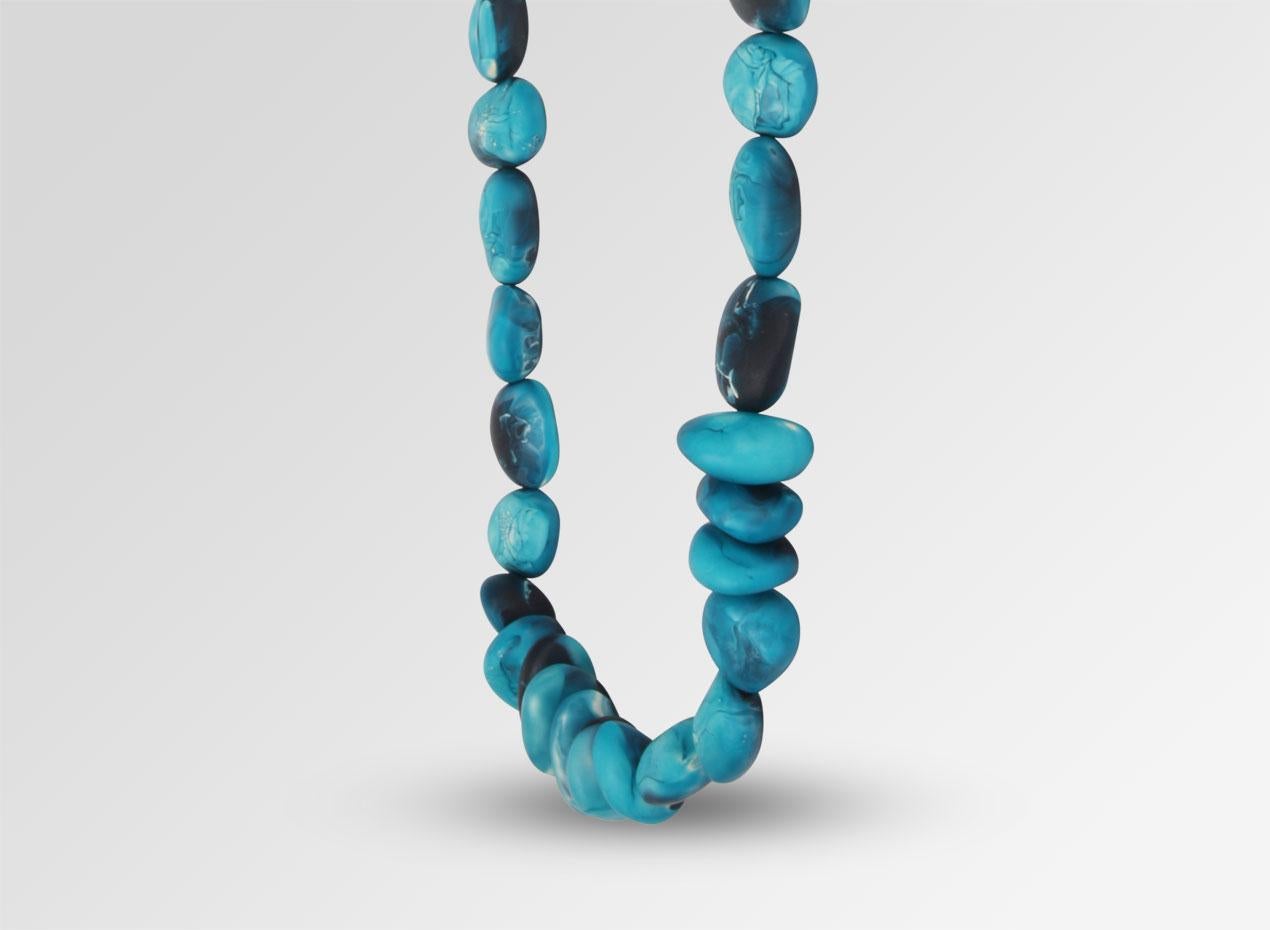 Resin beaded necklace with silver detailing. This necklace is featured in our Classic colour, Moody Blue. 

Dinosaur Designs resin products are hand made in Sydney, Australia. Each piece is unique and we cannot guarantee you will receive an item