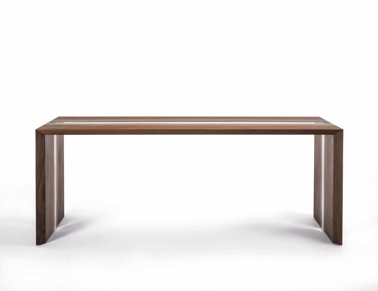 Console Table Resin Linea with solid walnut
wood varnished. With high quality resin in center.
Treated wood with natural pine extract.
Available in:
L 165 x D 49.5 x H 85cm, price: 8900,00€
L 180 x D 49.5 x H 85cm, price: 9900,00€
L 195 x D 49.5 x H