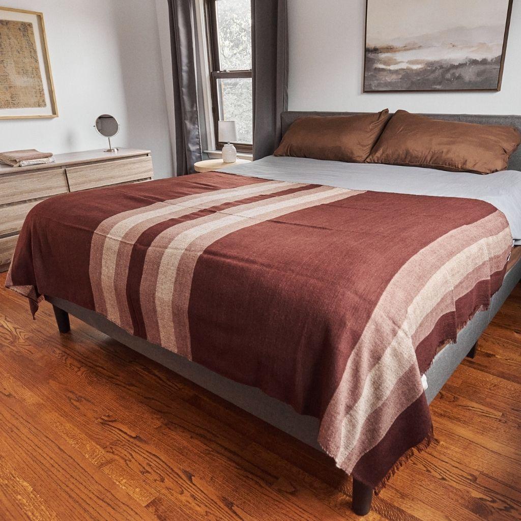 Custom design by Studio Variously, Resin Queen Size Bedspread / Coverlet is a plush handloom textile ethically woven by master weavers in Nepal and dyed entirely with earth friendly dyes in soft 100% merino yarn.

A sustainable design brand based