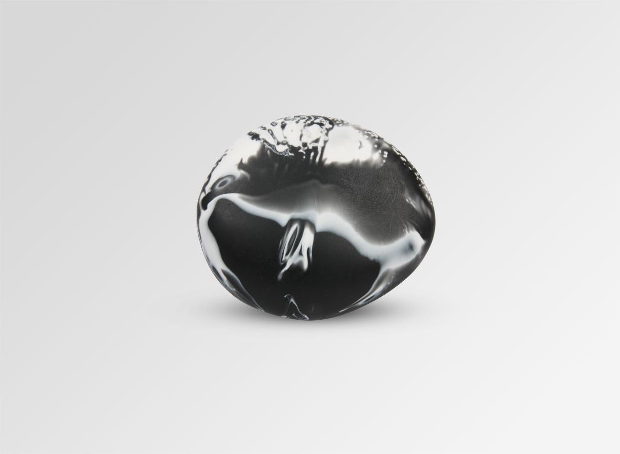 Resin ring. This ring is featured in our Classic colour, Black Marble. 

Dinosaur Designs resin products are hand made in Sydney, Australia. Each piece is unique and we cannot guarantee you will receive an item exactly identical to what is that