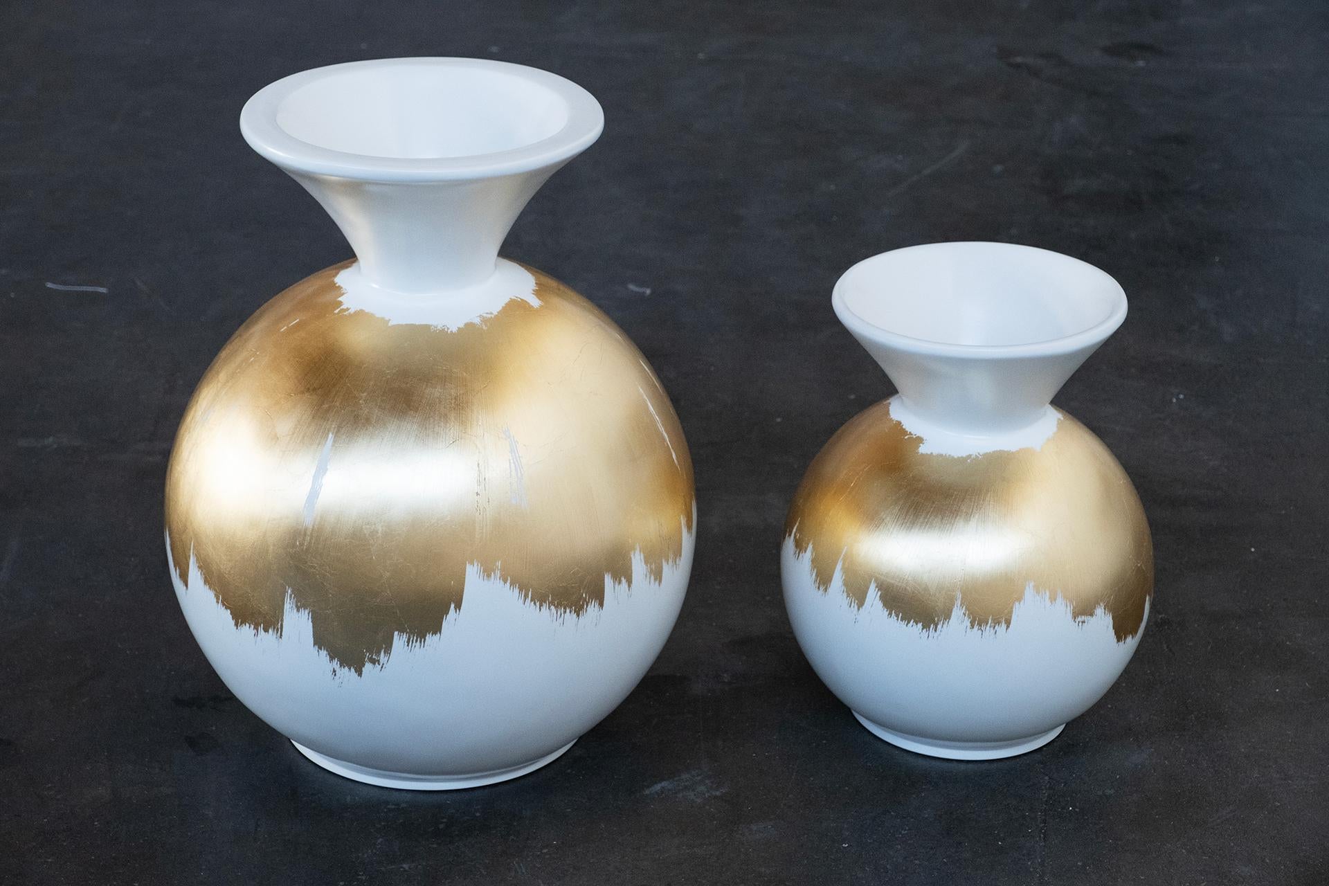 Resin Decorative Vase White Gold Leaf, Lusitanus Home Collection, Handcrafted in Portugal - Europe by Lusitanus Home.

This beautiful decorative vase is lacquered in white cotton lacquer and has details in gold leaf applied by