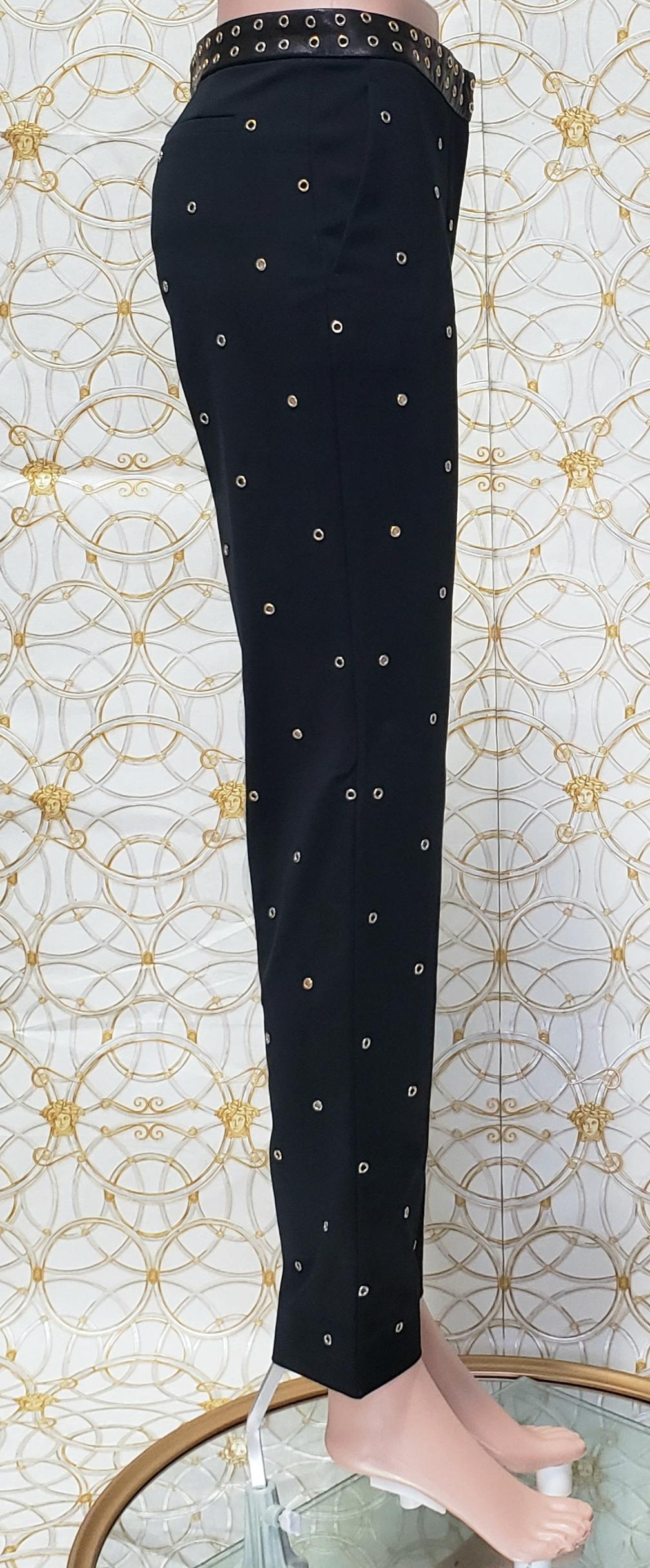 Resort 2012 Look # 5 VERSACE BLACK STRETCHY PANTS with RIVETS size 38 - 2 In New Condition For Sale In Montgomery, TX