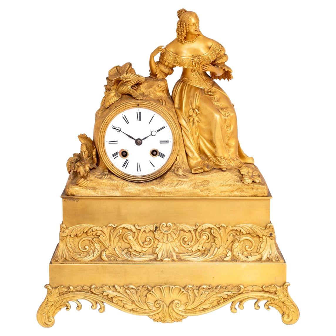 Reloj Figural de Metal Dorado Restauration
