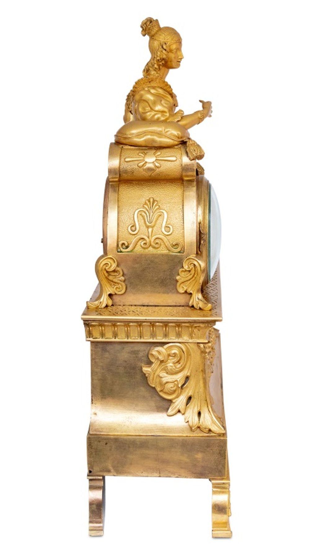 French Restauration Gilt Metal Figural Mantel Clock For Sale