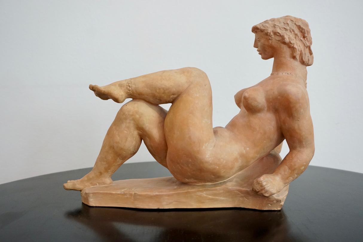 Resting woman terracotta sculpture by Jeno Kerényi, 1961

The statute 