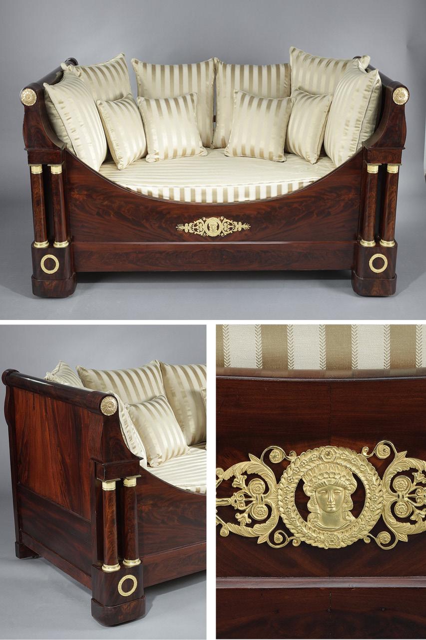 Restoration period mahogany veneered boat-shaped bed with a slightly overturned bedside. The front is soberly dressed with an ormolu plaque with scrolls and flowers framing a female face with antique hair in a laurel wreath, finely chiseled. Two