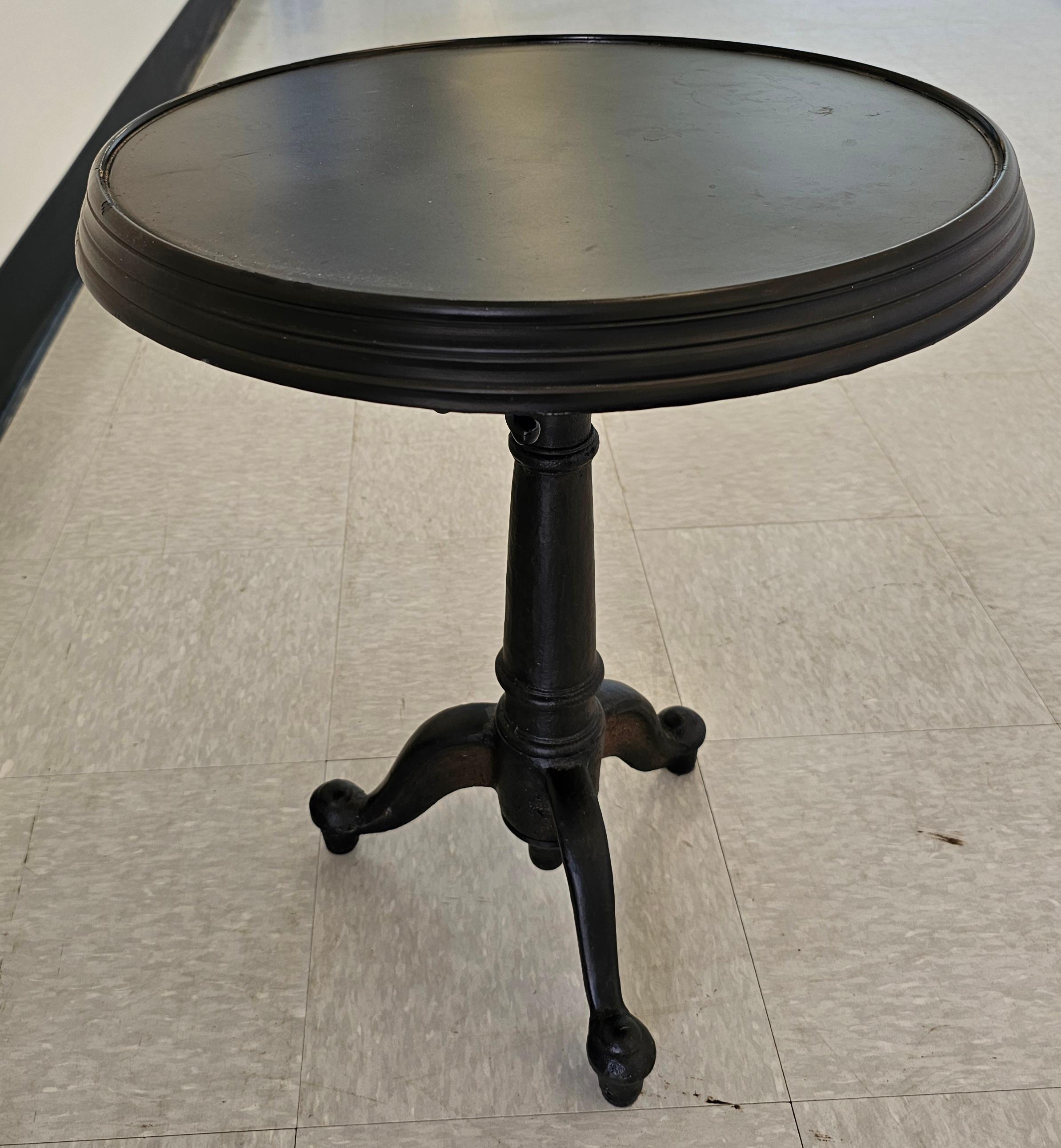 Restoration Harware Cast Iron Adjustable Height Tilt Top Side table or  Pedestal.
 Painted in dark brown chocalate. Very heavy and great condition.
Measures 18