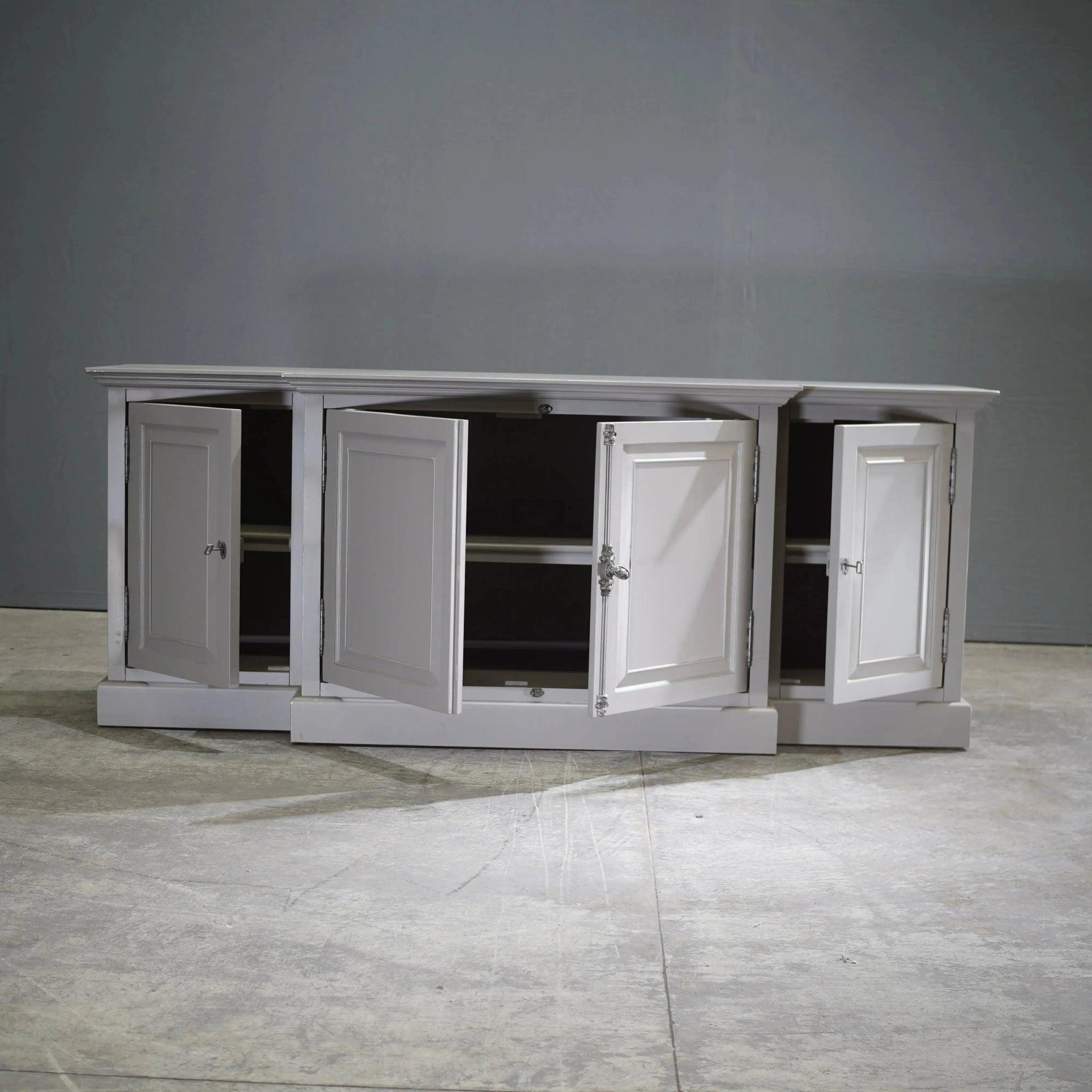 Introducing the Restoration Hardware French Panel Grey Media Sideboard, a stunning creation by renowned designer Luay Al-Rawi. This exquisite sideboard embodies the perfect fusion of classic French style and modern functionality. The piece boasts a