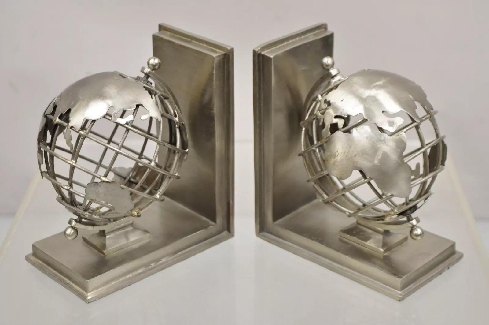 Restoration Hardware Industrial Modern Metal Spinning Globe Bookends - a Pair. Circa Late 20th Century. Measurements: 6.5