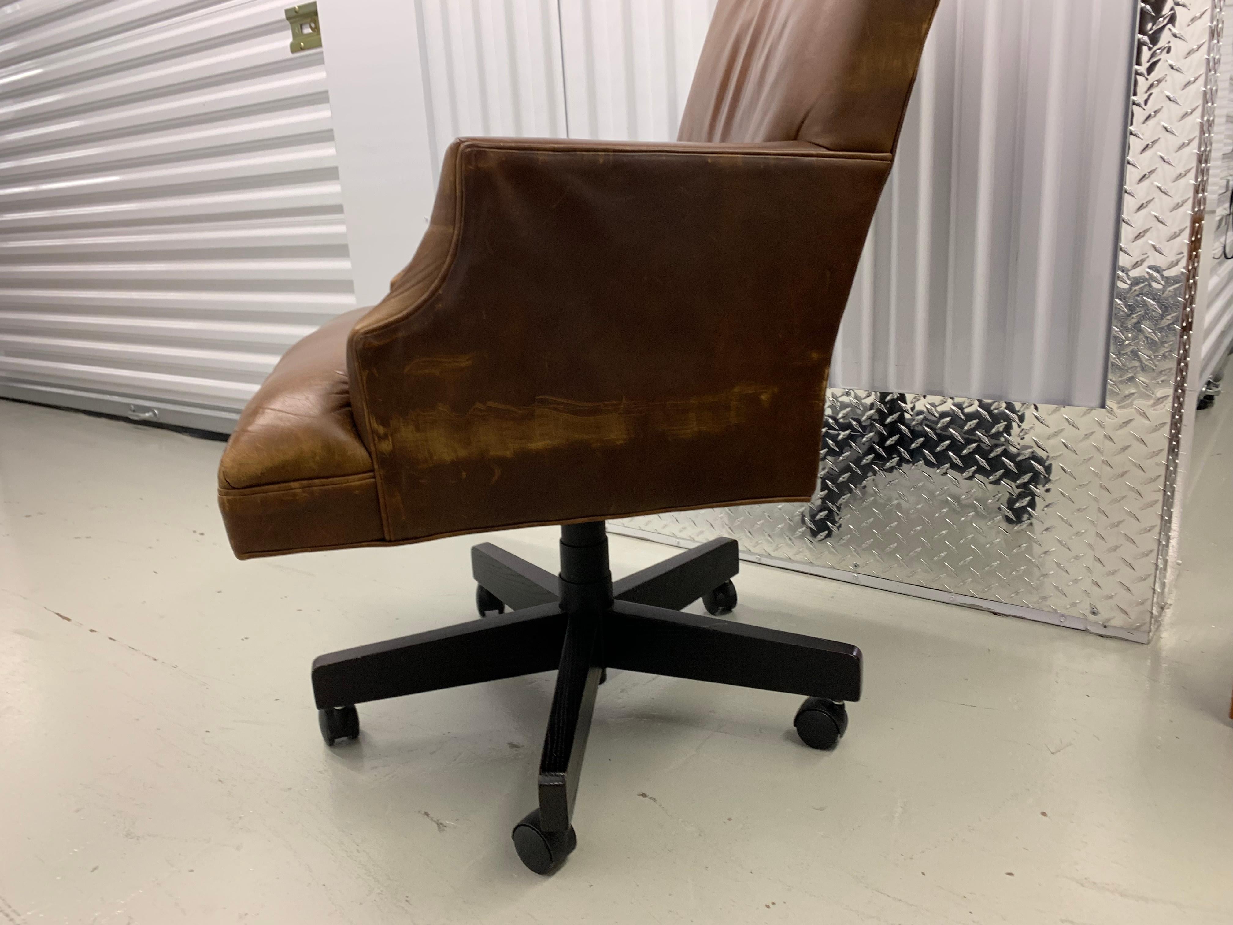 Belgian Classic leather armchair,
5 star base with rolling casters, 
adjustable seat

Soft leather with a comfy, lived in patina
great for your office or library.
