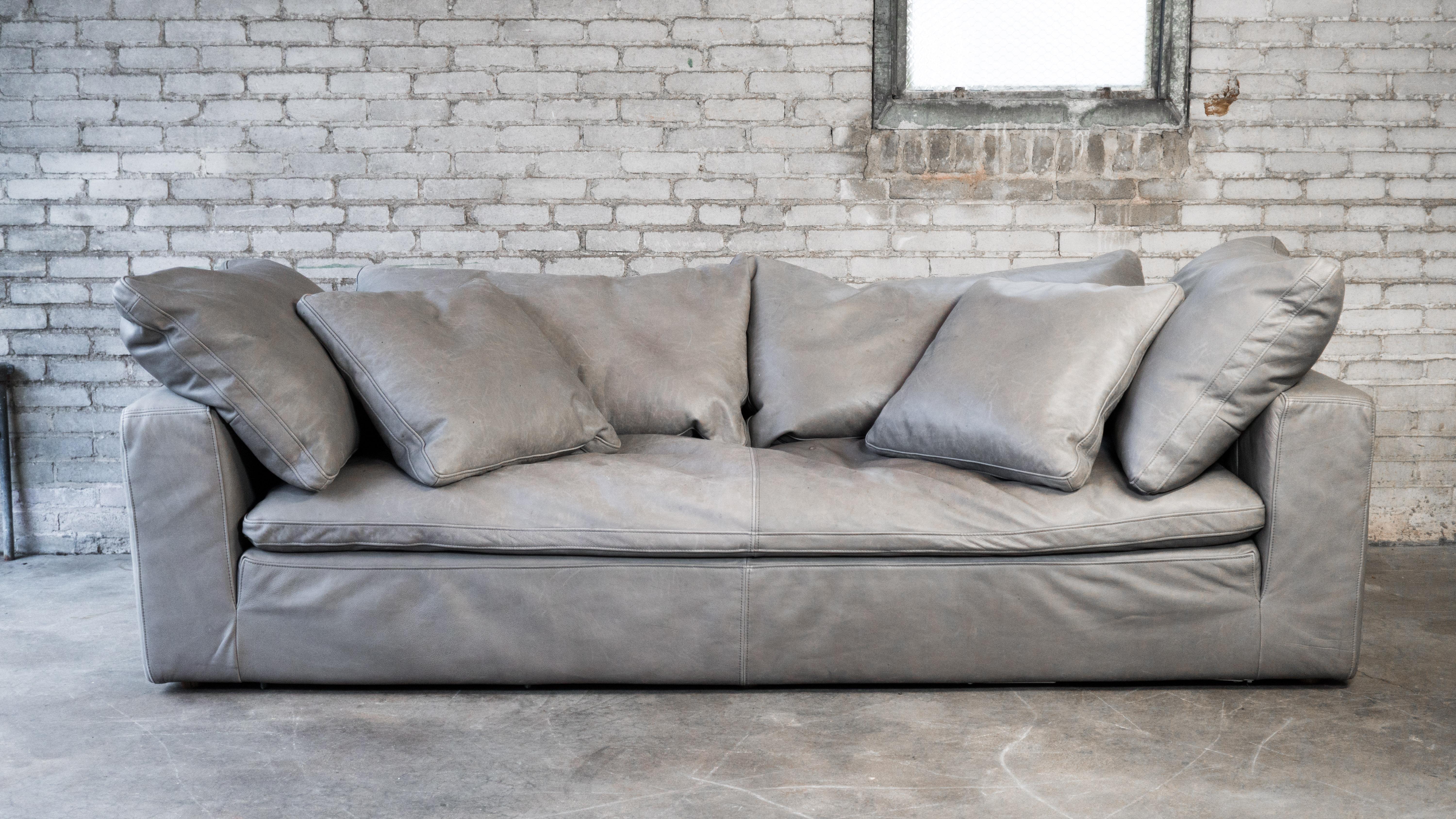 Restoration Hardware Leather Cloud bench sofa. 8 feet long, circa 2018. Lovely soft and supple light gray leather and 100% feather down filled cushions and pillows, makes the seating experience utterly comfortable and luxurious. Designed by Timothy
