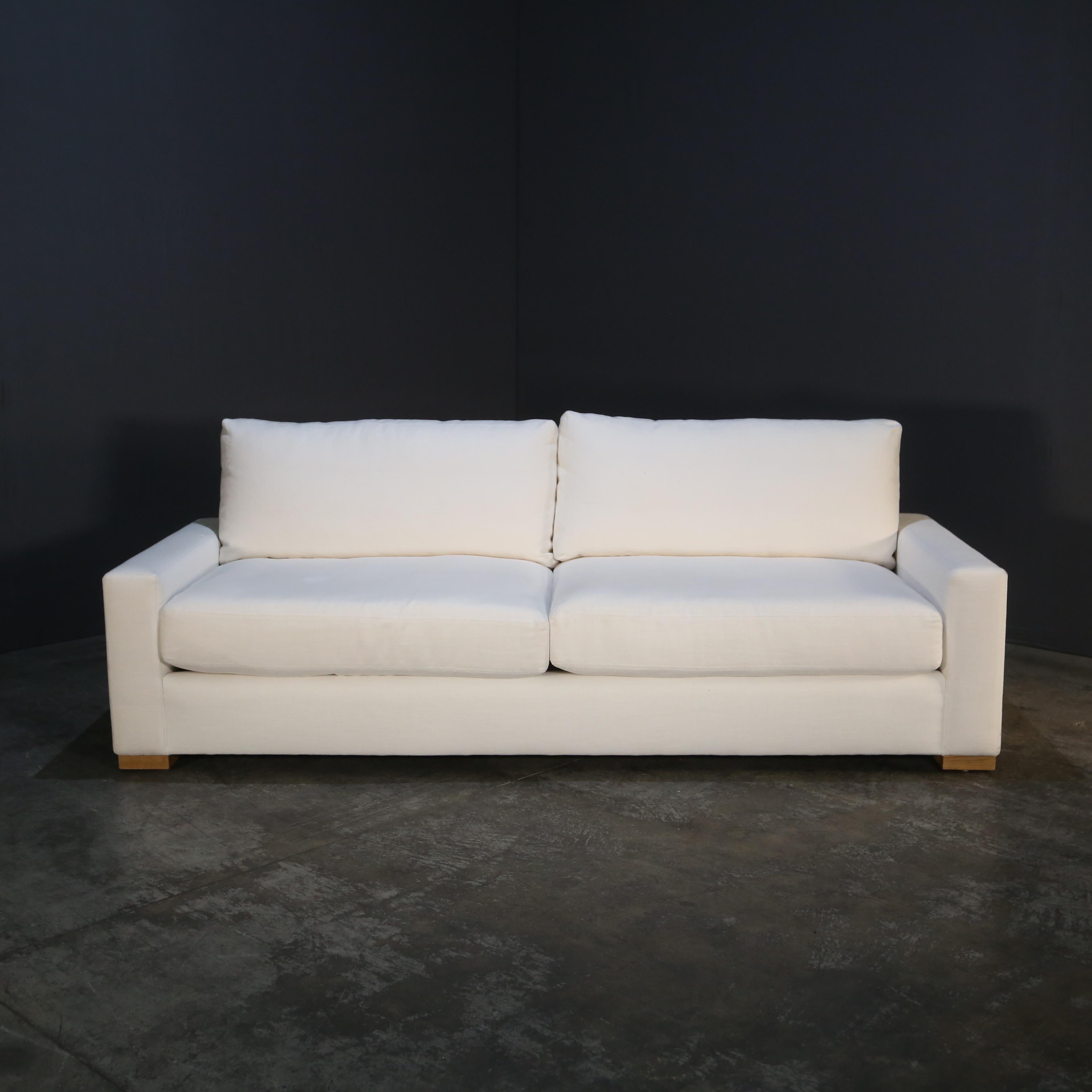 The Restoration Hardware Maxwell Sofa epitomizes understated luxury and contemporary design. With its clean lines, low-slung profile, and broad track arms, this sofa offers a perfect balance of style and comfort. Expertly upholstered in premium