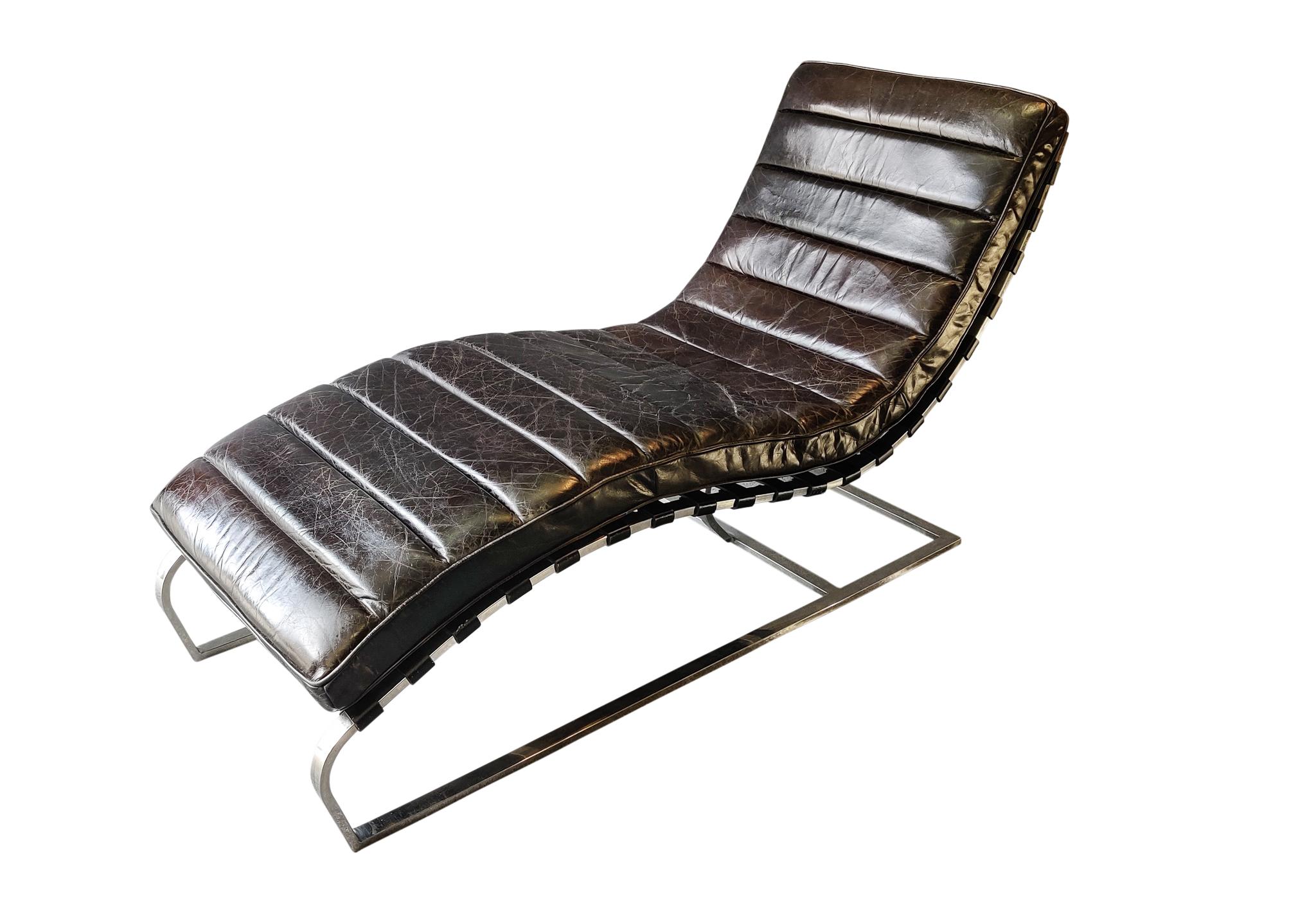Inspired by a classic 1960s midcentury silhouette, this chair's graceful curves hug the body for optimal comfort. Constructed with heavy chromed steel and quality stitched leather, this chaise is sturdy, comfortable, and quite attractive. In