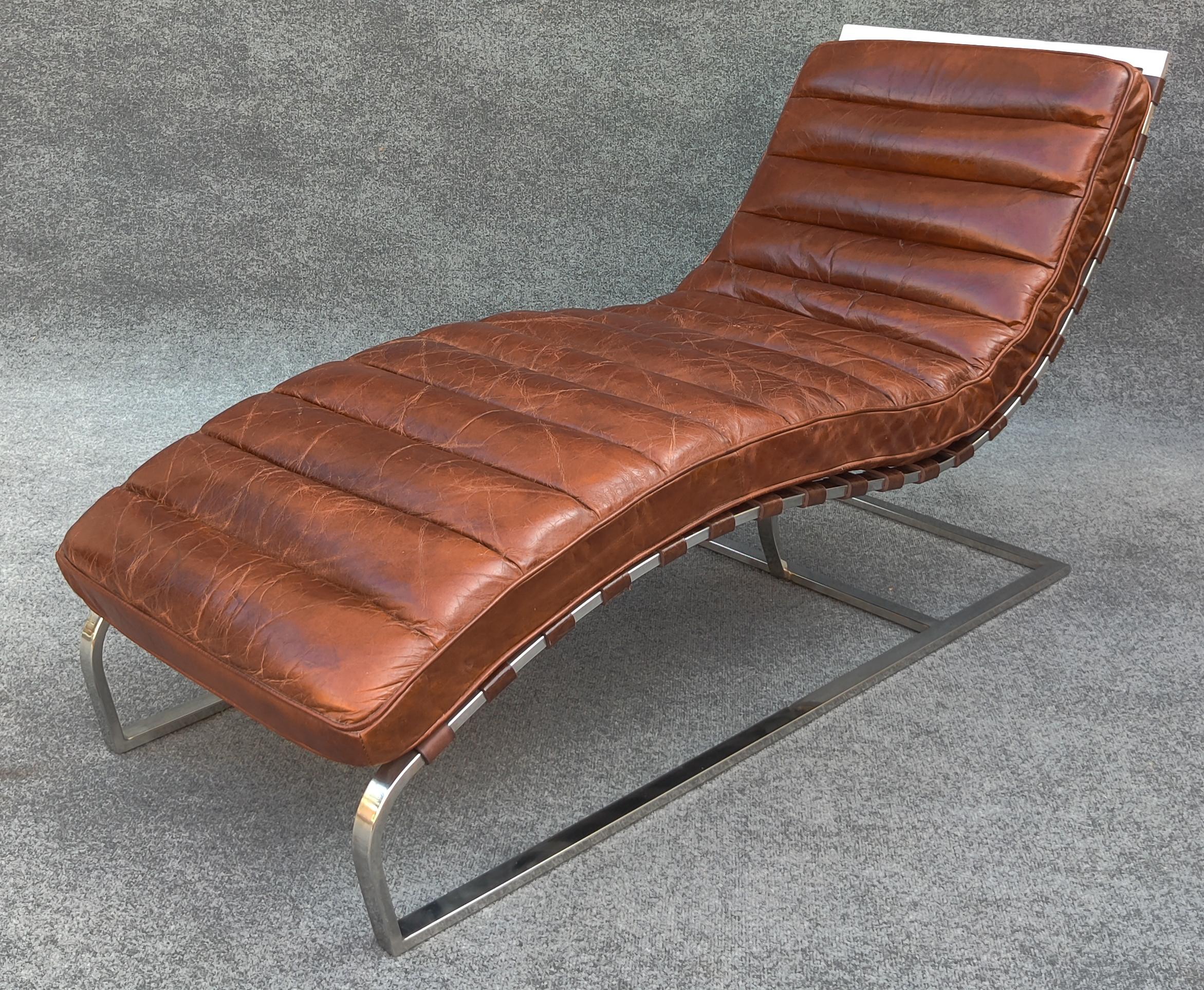 Inspired by a classic 1960s midcentury silhouette, this chair's graceful curves hug the body for optimal comfort. Constructed with heavy chromed steel and quality stitched leather, this chaise is sturdy, comfortable, and quite attractive. In an