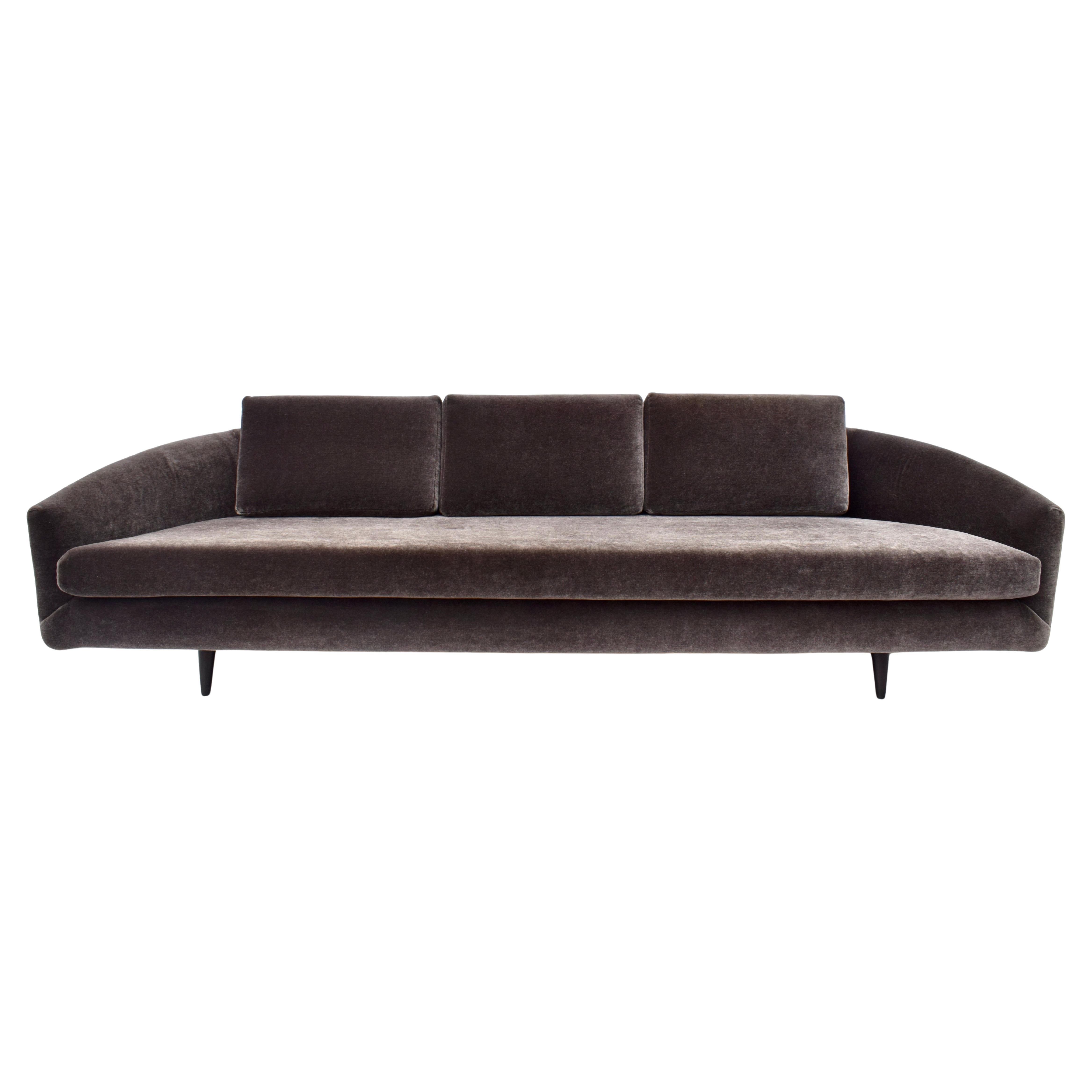 Gorgeous Restoration Hardware Stratus Sofa in custom Mohair, designed by iconic American architect and furniture designer Adrian Pearsall; 1950s. The Stratus sofa melds serene minimalism with sumptuous comfort in Its low, wraparound back, elegant