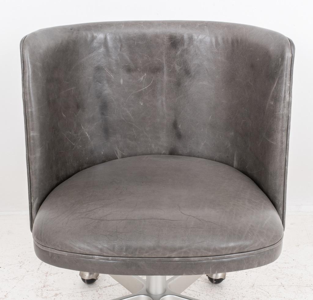 Restoration Hardware swivel office desk chair raised on silvered metal base mounted on caster, with grey leather upholstery, label to underside.

Dealer: S138XX