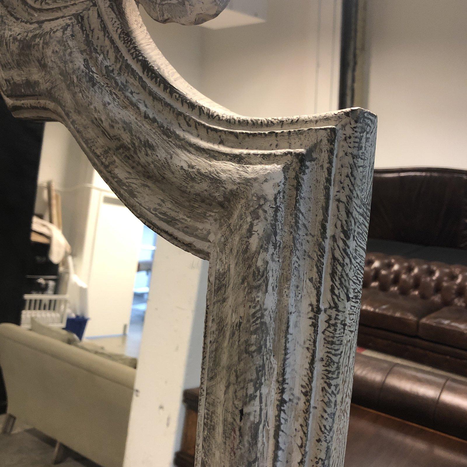 A Maison Grande Louis XIV Floor Mirror. Designed by Tara Shaw for Restoration Hardware. The crown can be removed. A solid wood frame in a distressed taupe finish.

About Tara Shaw:
