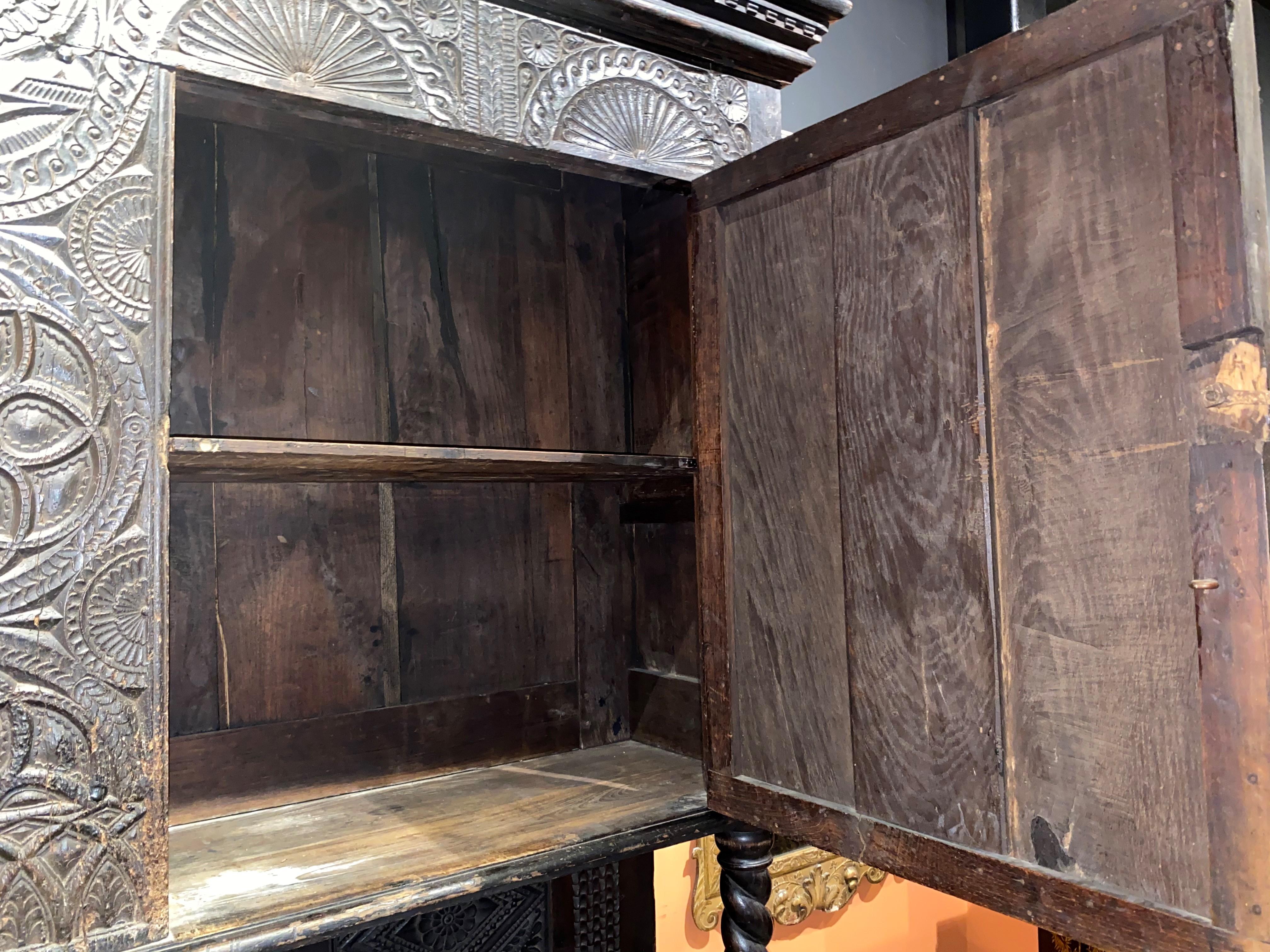 Restored 17th C Continental Two Part Cupboard with Exceptional Carving For Sale 9